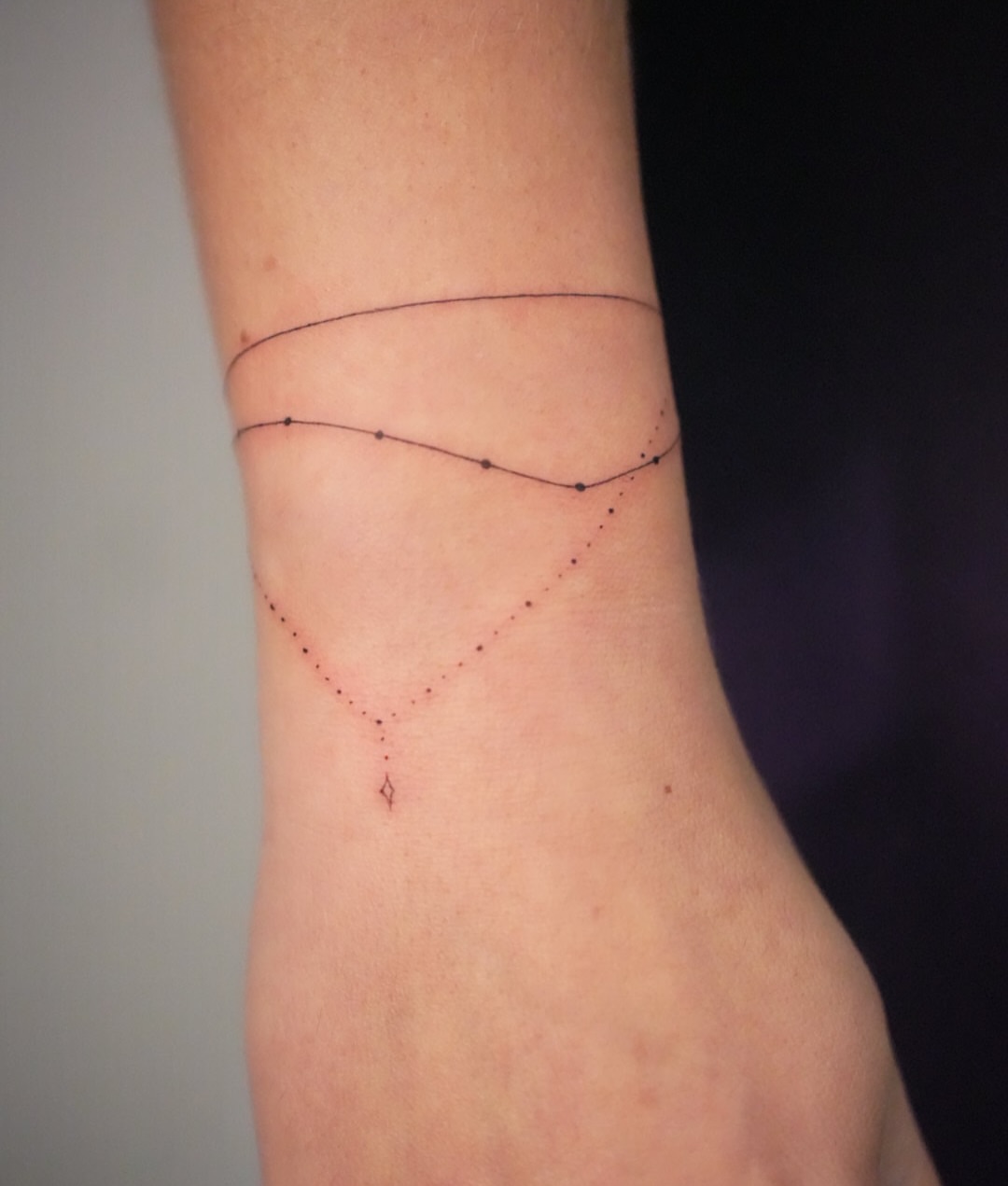 Geometric pattern dotwork tattoo on the forearm by Tattoo fine line NY