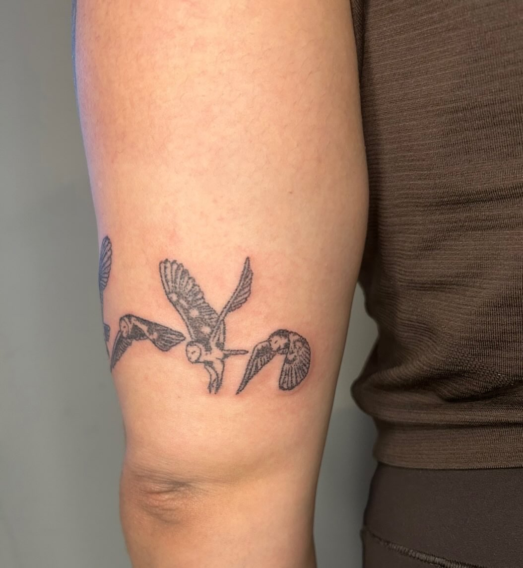 Owls black and grey tattoo on the forearm by ˙⋆✮⋆˙‧₊˚✧ sophie ✧˚₊‧˙⋆✮⋆˙