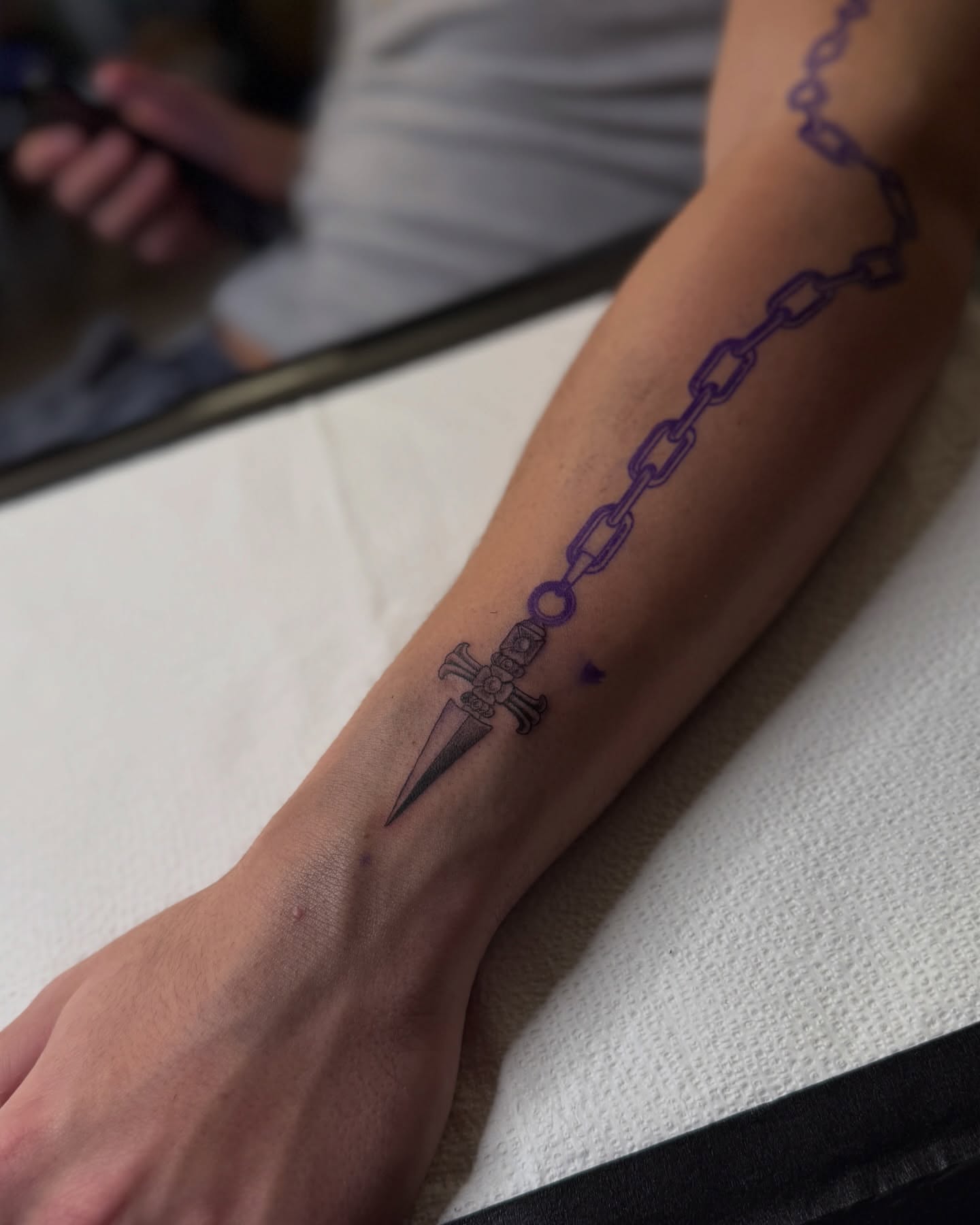 Chain and dagger black and grey tattoo on the forearm by ๐
๐๐๐๐ณ๐ฎ๐ฆ๐ข ๐๐๐ญ๐ญ๐จ๐จs