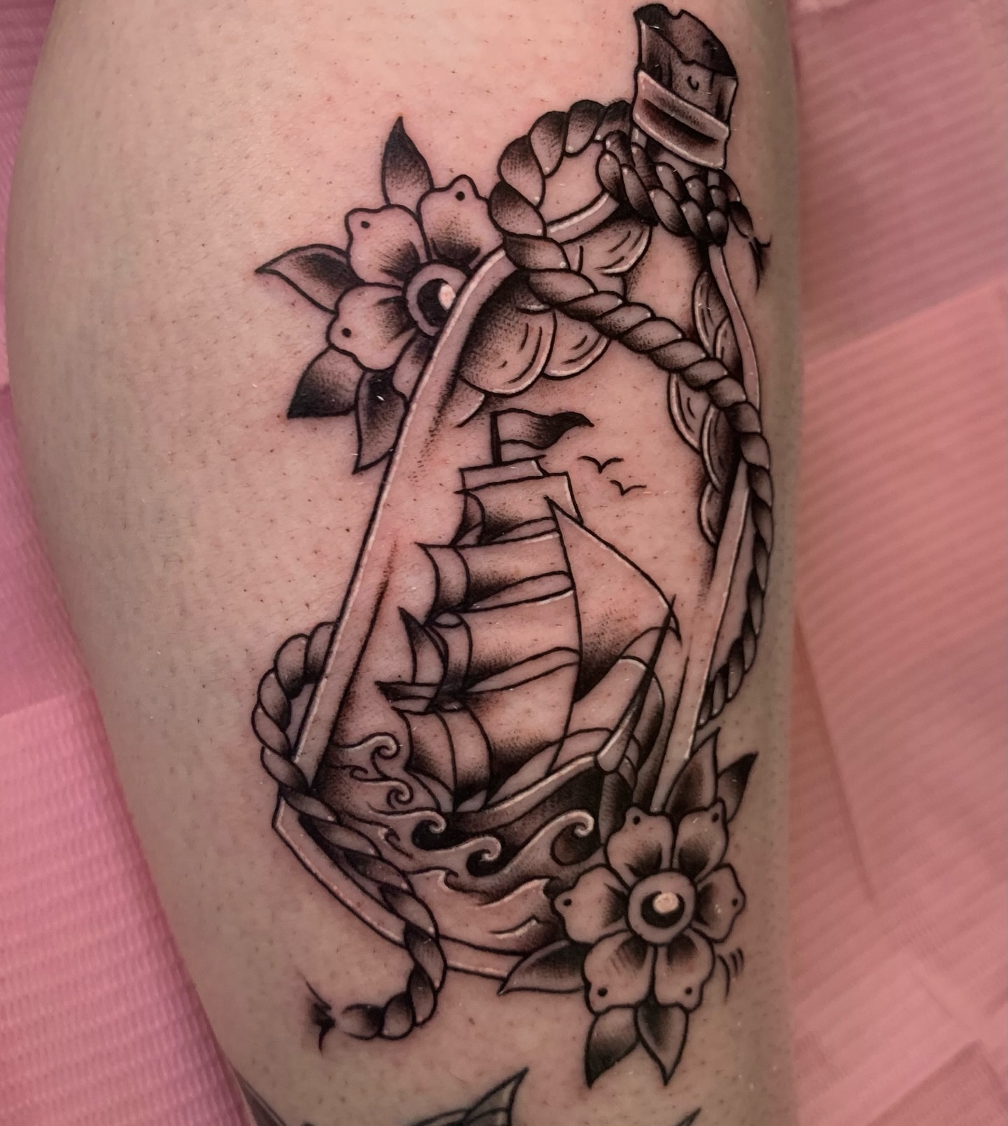 Ship in rope American traditional tattoo on the forearm by Aubrianna Grisez