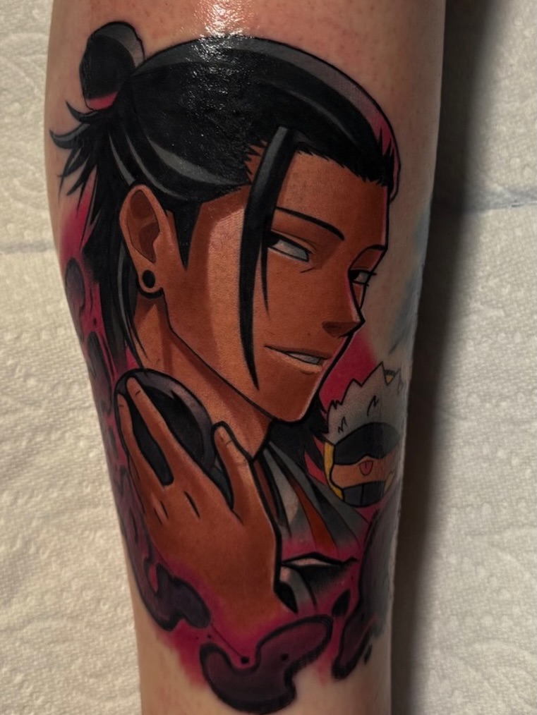 Anime character anime tattoo on the forearm by Jake lyon