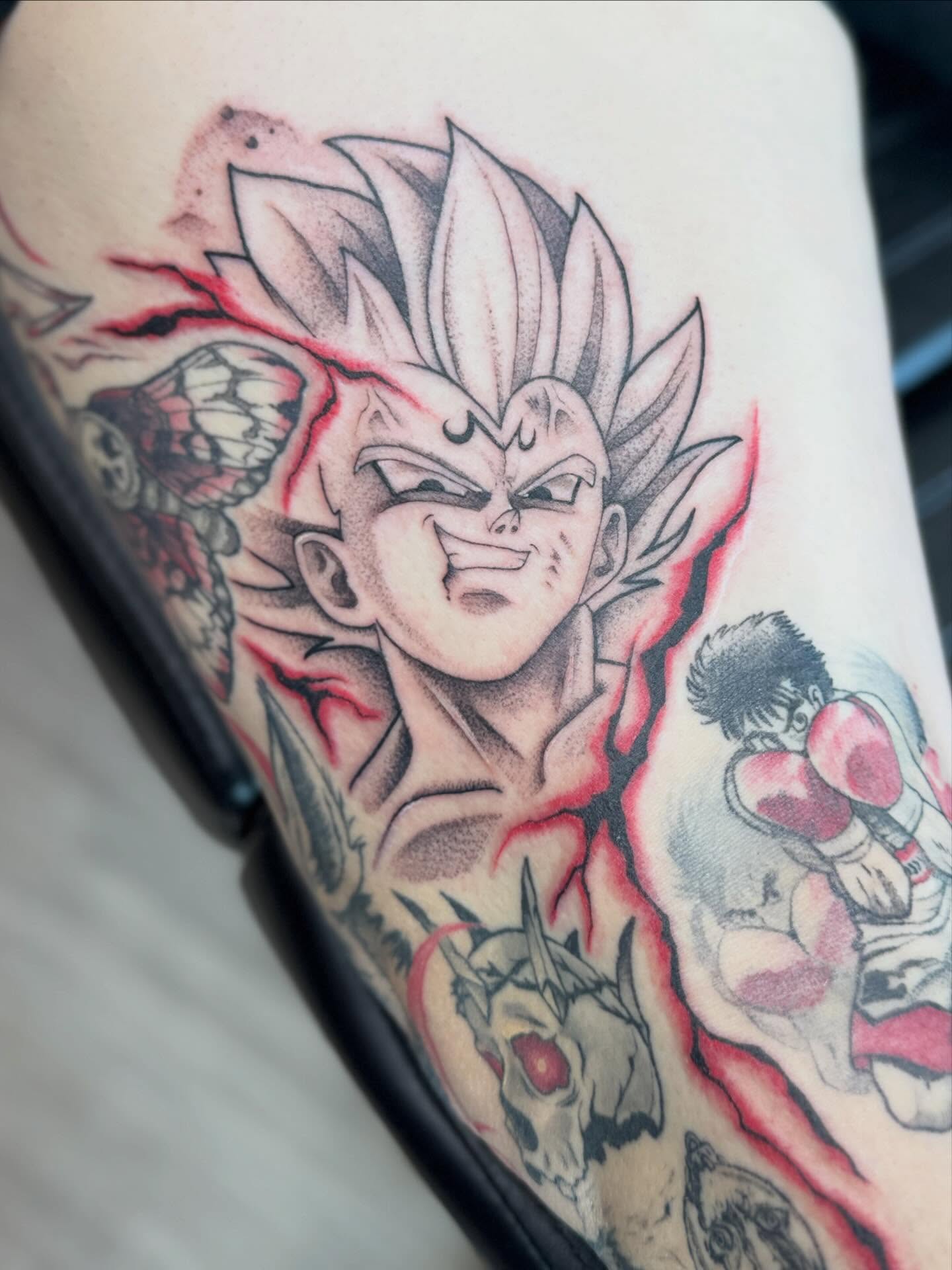 Dragon ball characters anime tattoo on the thigh by Rebecca Rose