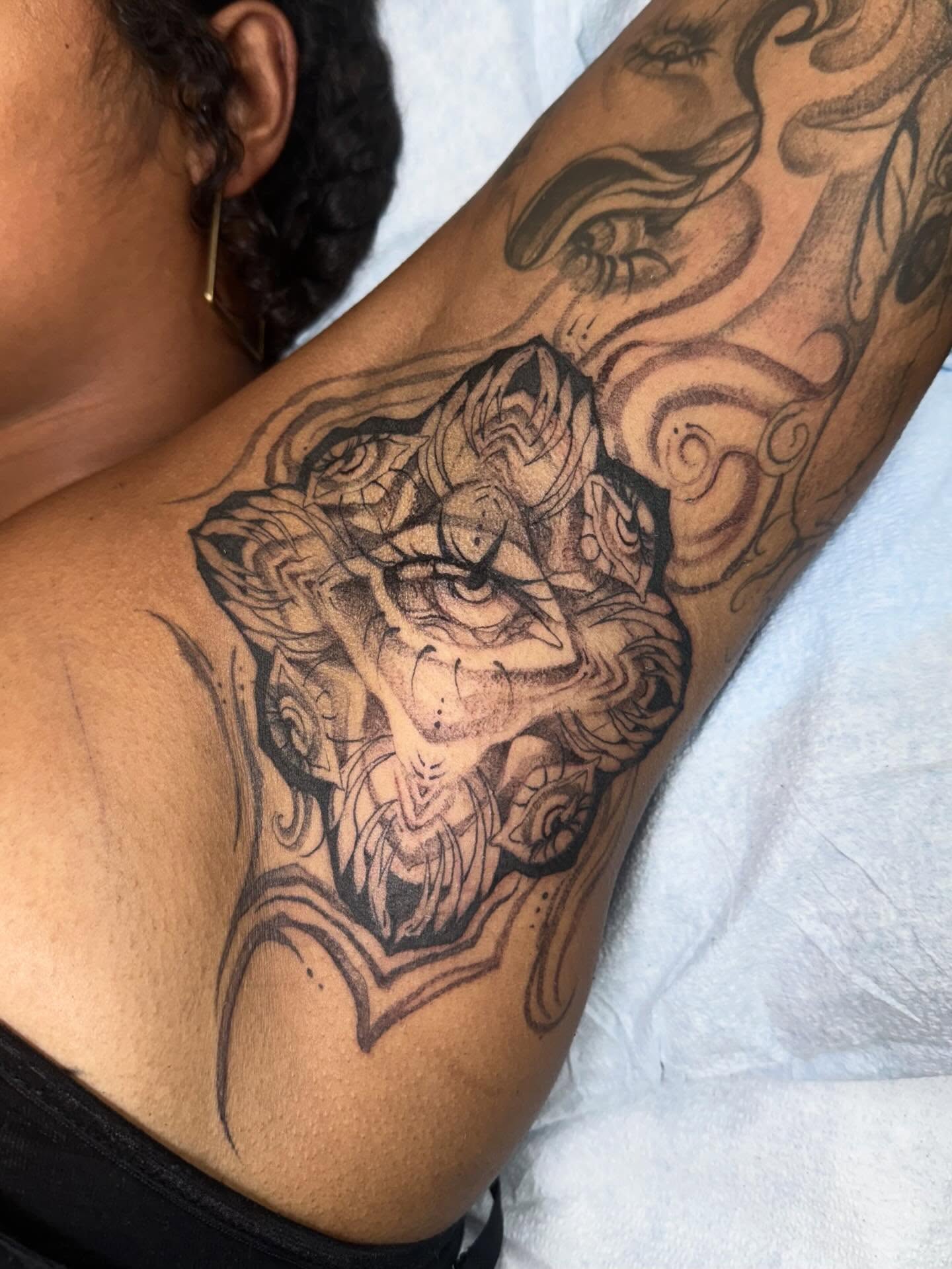 Lion realism tattoo on the shoulder by Isabella π€