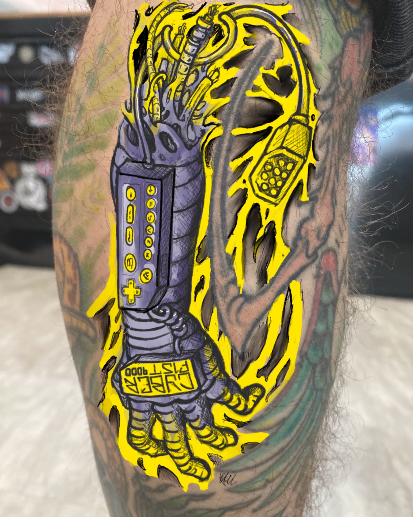 Video game controller new school tattoo on the forearm by James Bird, Vancouver, British Columbia