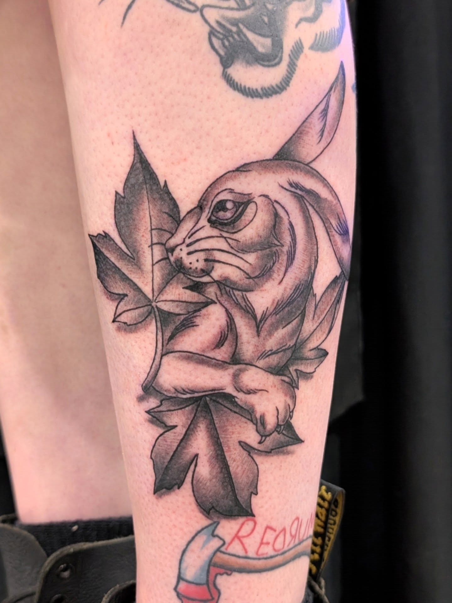 Tattoo by @hutch_tat — black_and_grey
