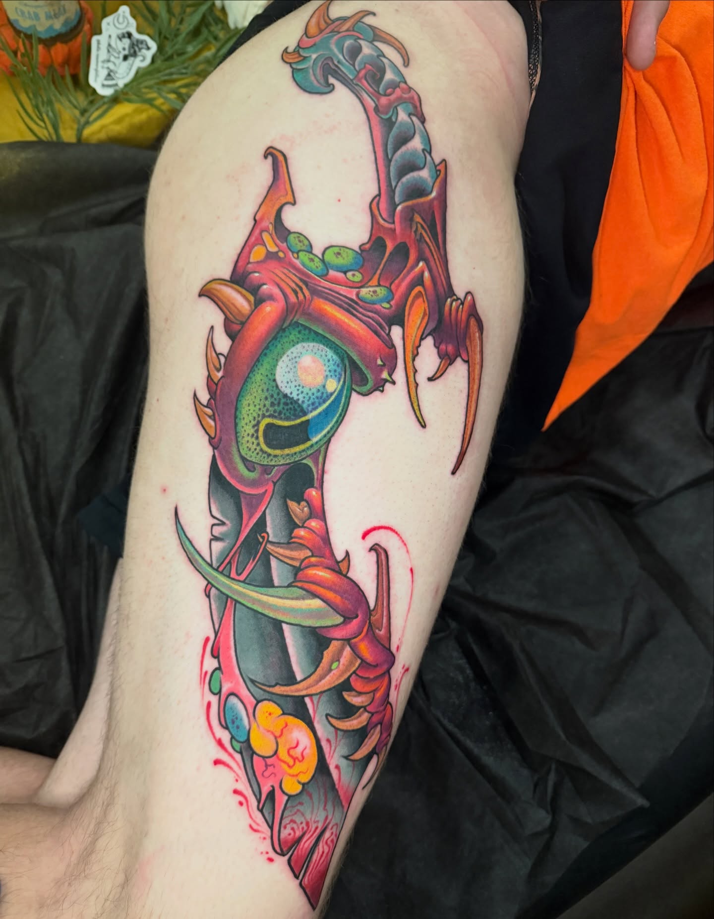 Alien creature surrealism tattoo on the thigh by JoshUA Bowers, Des Moines, Iowa