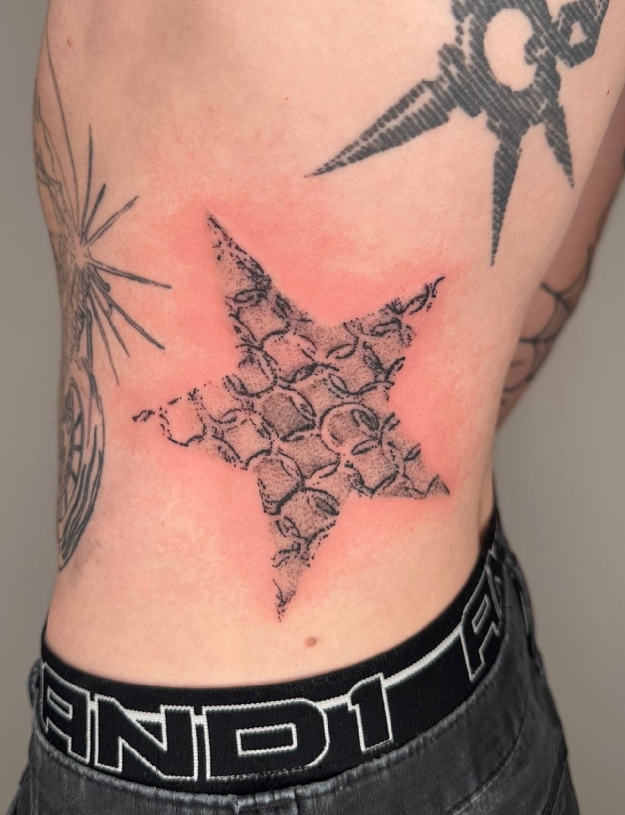 Rock star dotwork tattoo on the ribs by πΈππππππ