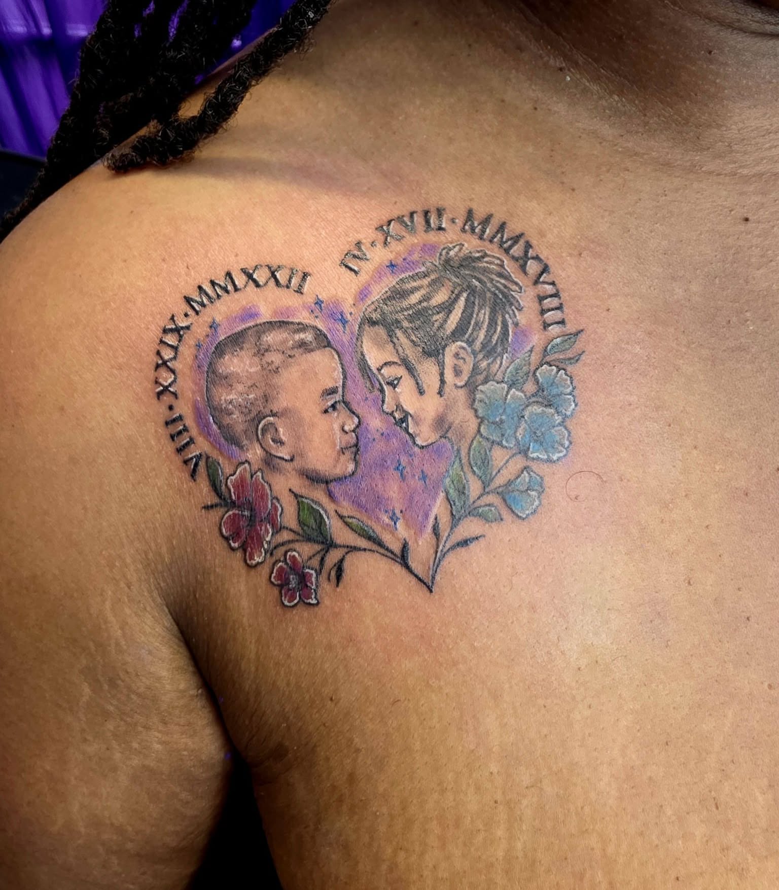 Heart with two faces dotwork tattoo on the shoulder by Jessica DarkRabbit