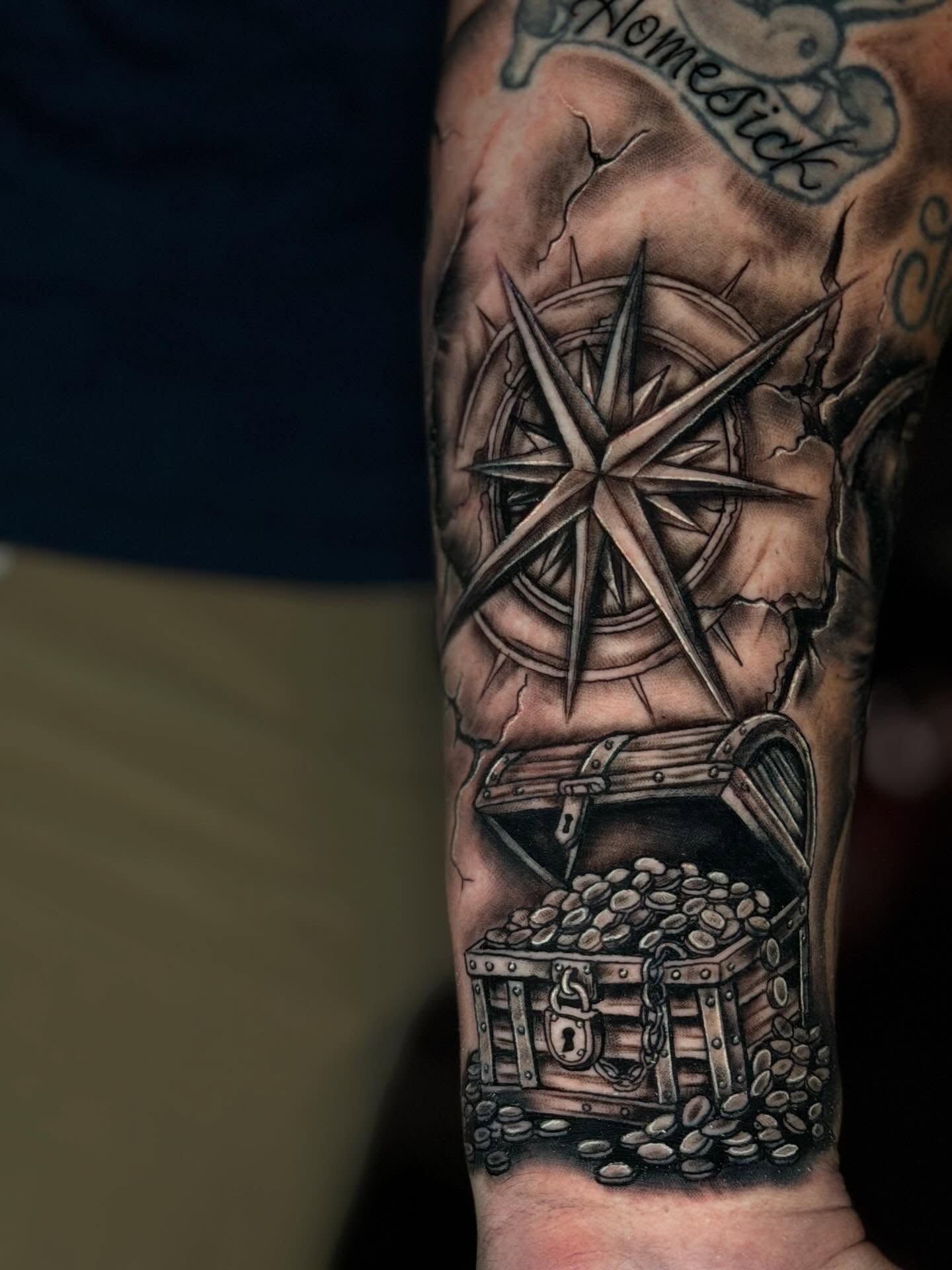 Compass and treasure chest realism tattoo on the forearm by Dany