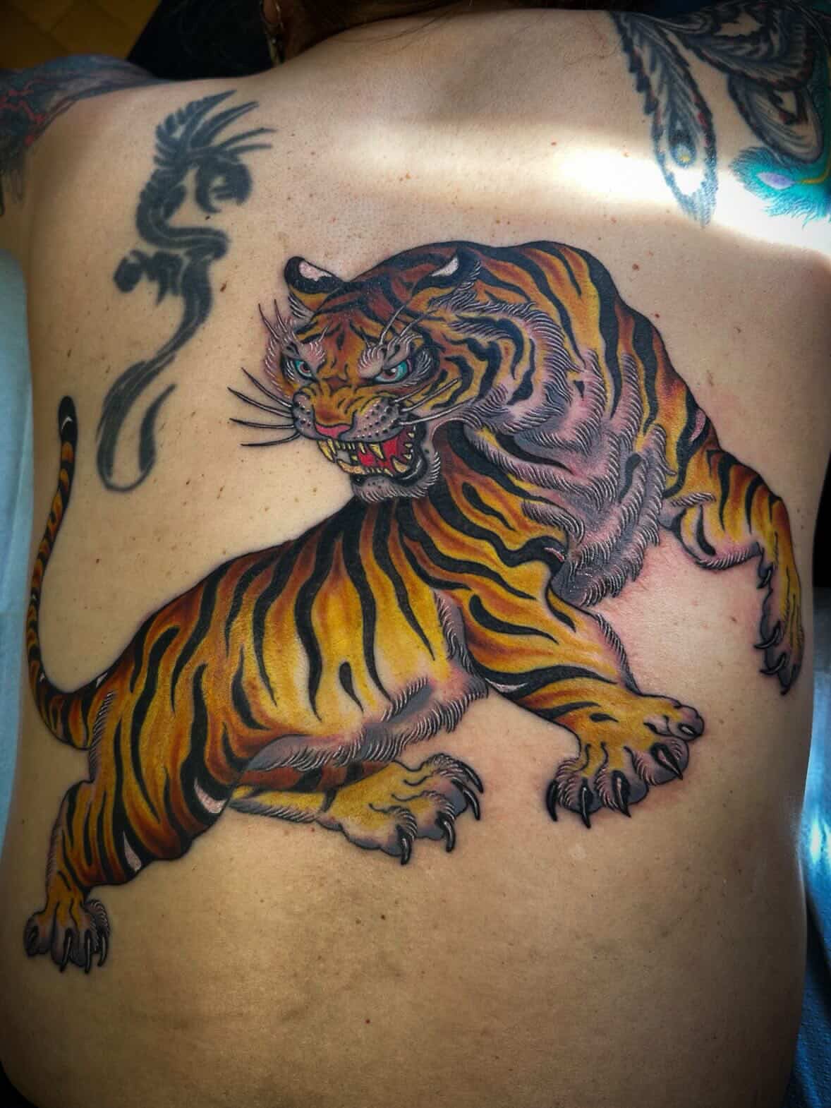 Tiger American traditional tattoo on the back by Colin Kenji Baker, San Jose, California