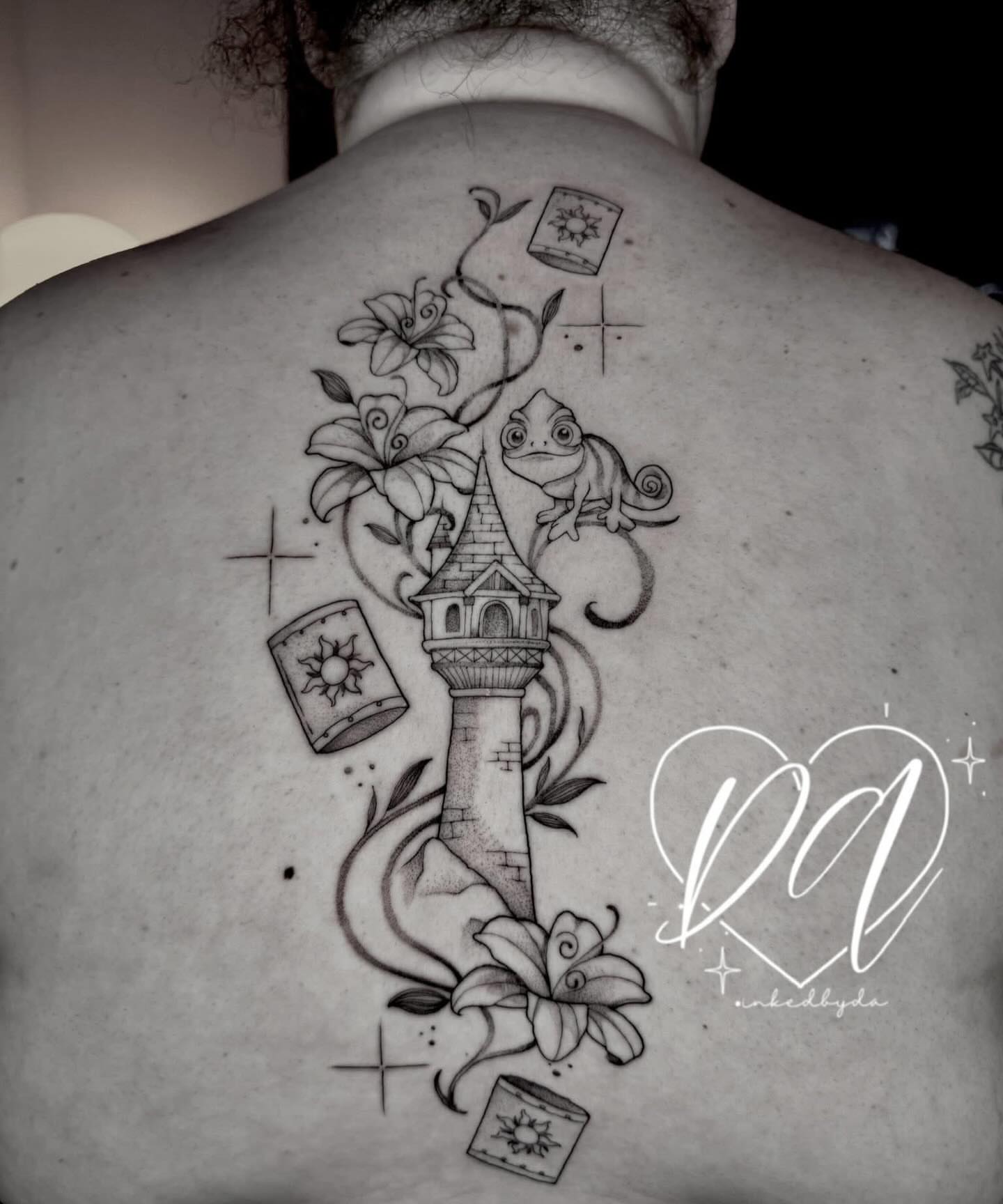 Castle and chameleon black and grey tattoo on the back by Dalton Alexandria