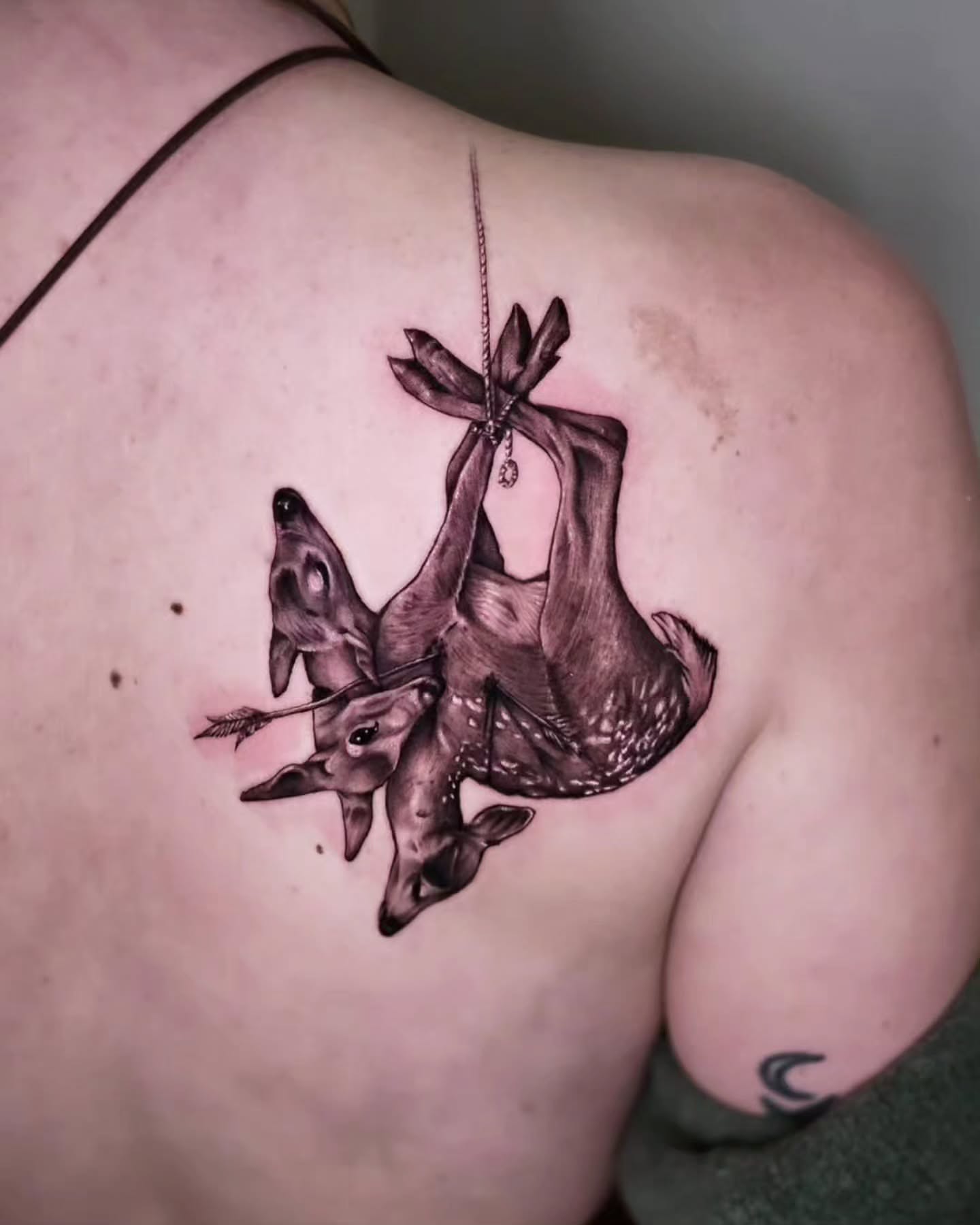 Deer black and grey tattoo on the shoulder by Jake Barney