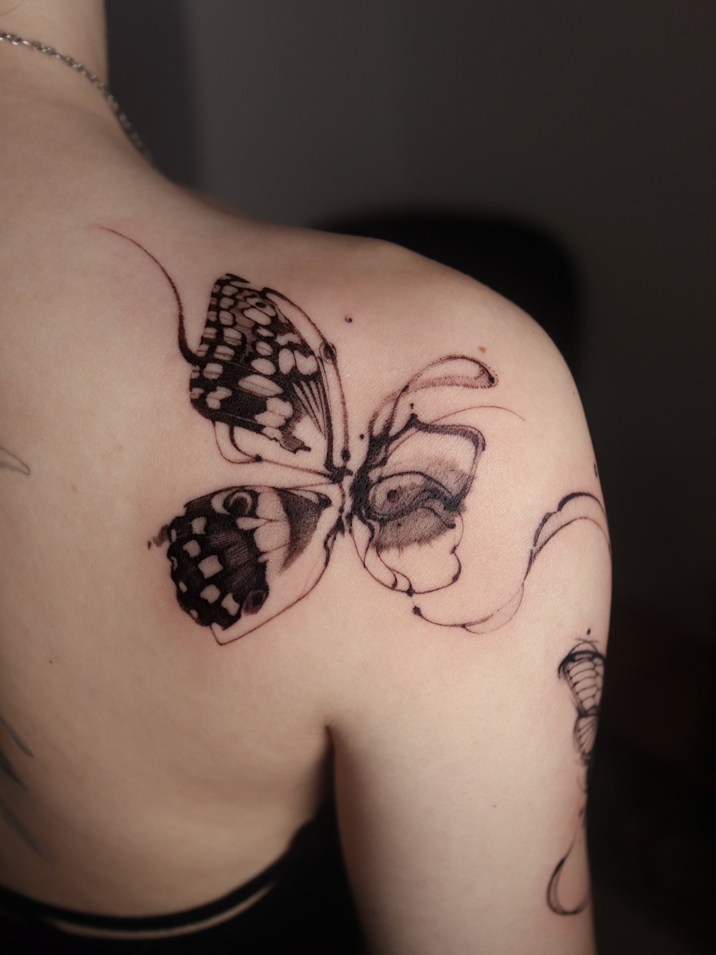 Butterfly black and grey tattoo on the shoulder by @tattoo_chamsae