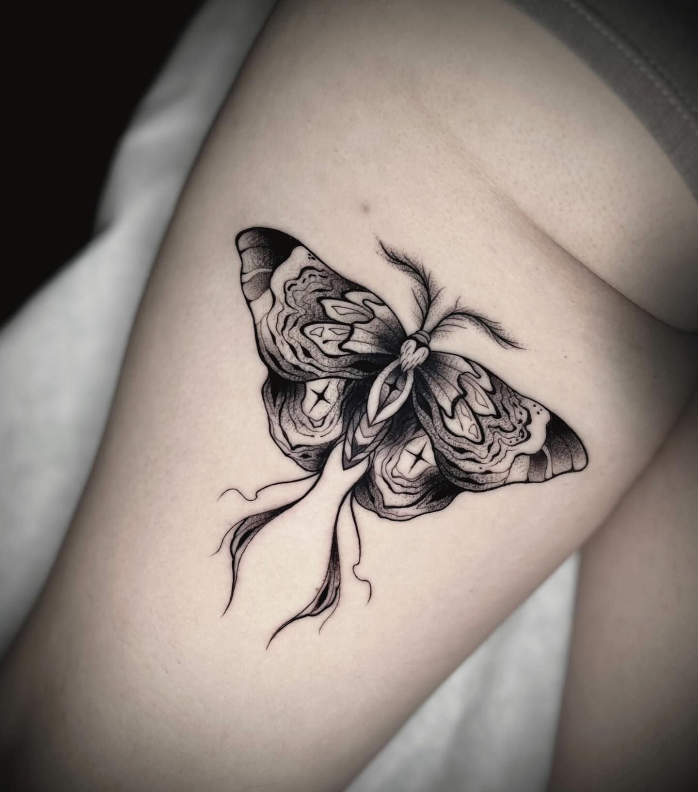 Butterfly realism tattoo on the thigh by Martha Gual π€ East ATX Tattooer