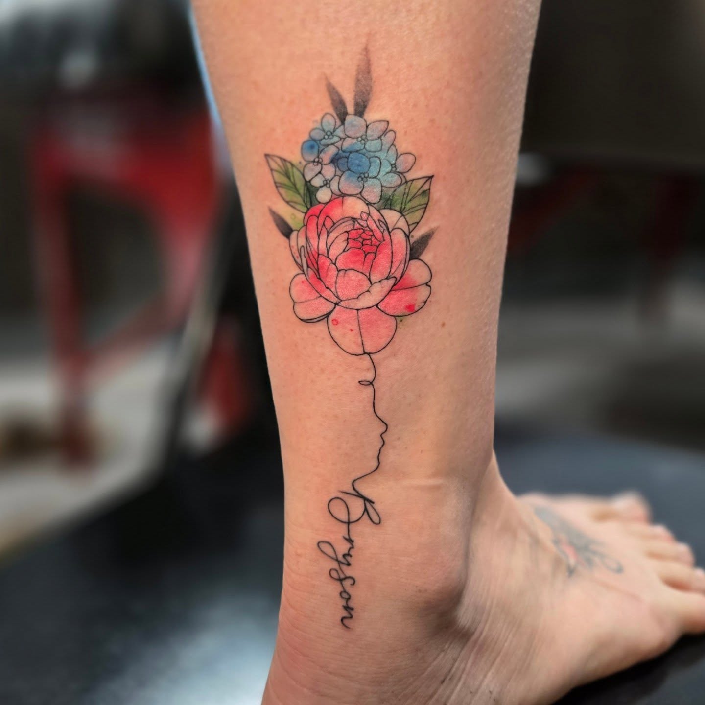 Peony and hydrangea bouquet watercolor tattoo on the calf by Britty Love, Nashville, Tennessee