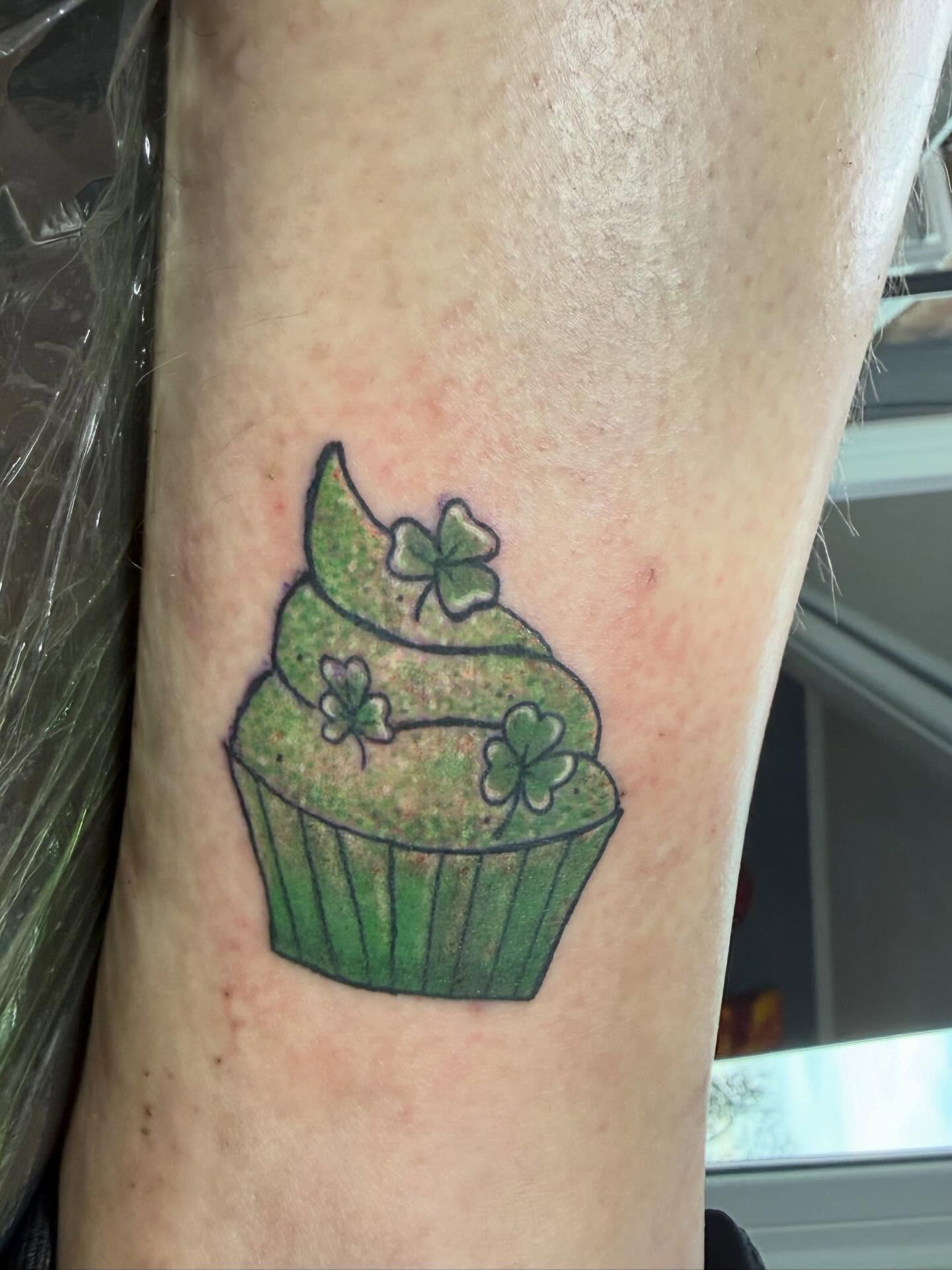 Cupcake new school tattoo on the forearm by Jillian Pardy