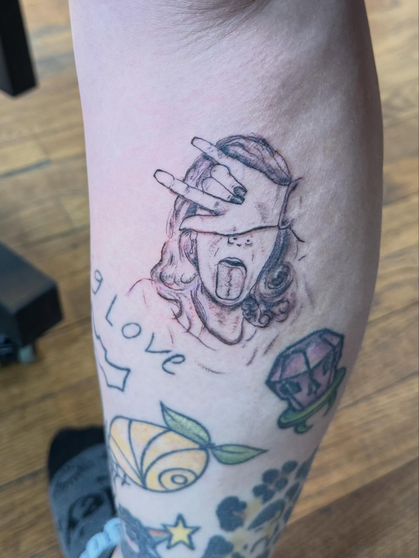 Smoking woman neo-traditional tattoo on the forearm by Jillian Pardy
