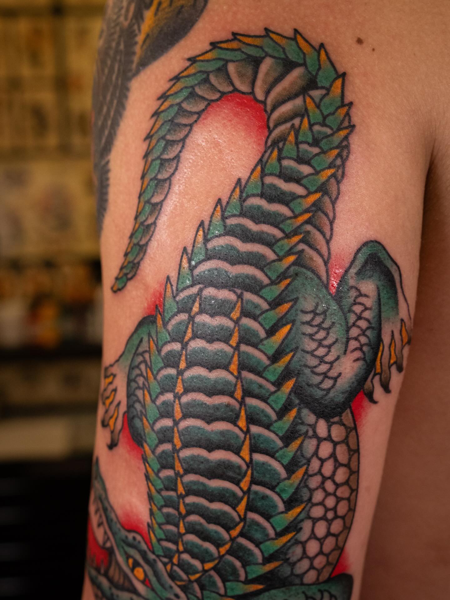 Serpent American traditional tattoo on the forearm by Justin Rakowski