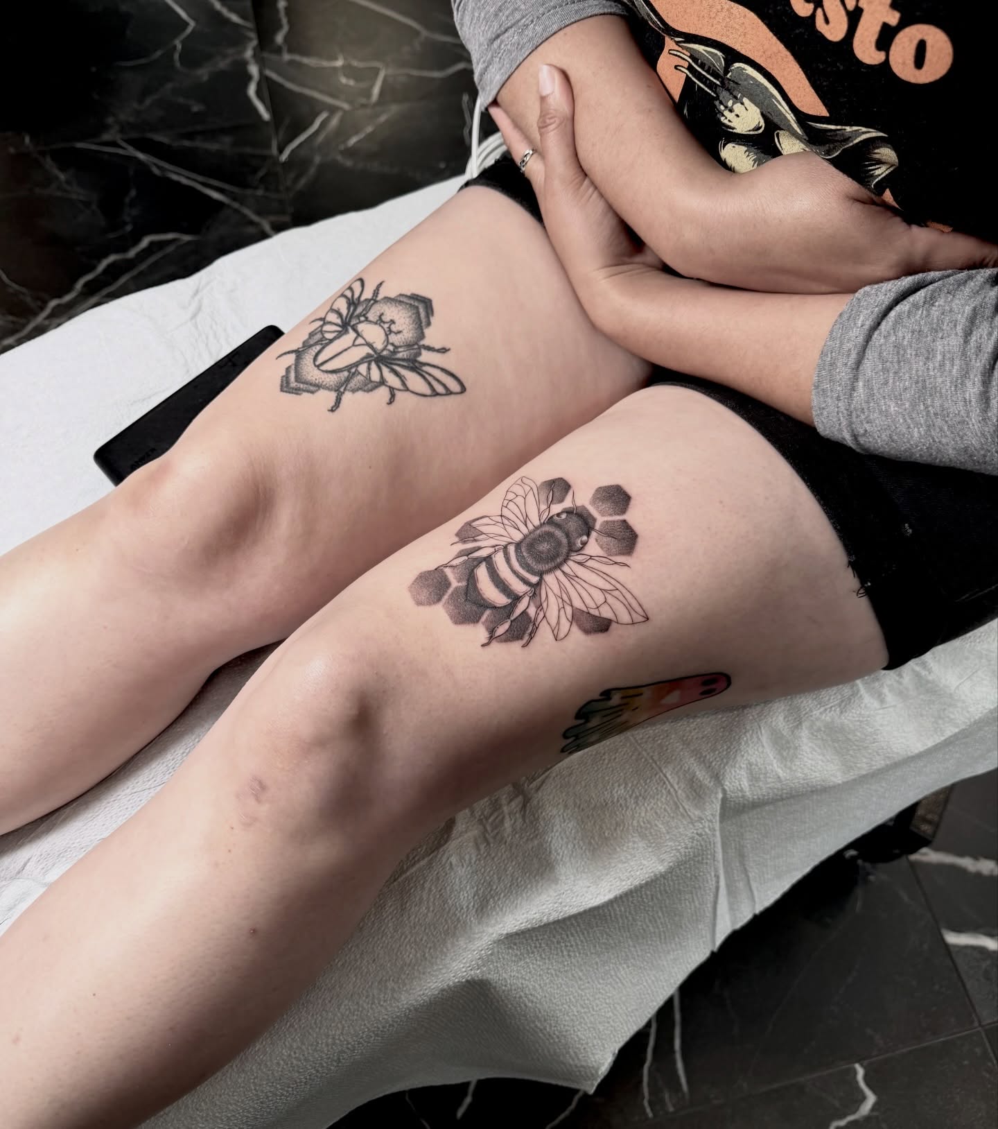 Bee dotwork tattoo on the thigh by Barbara Gonzalez