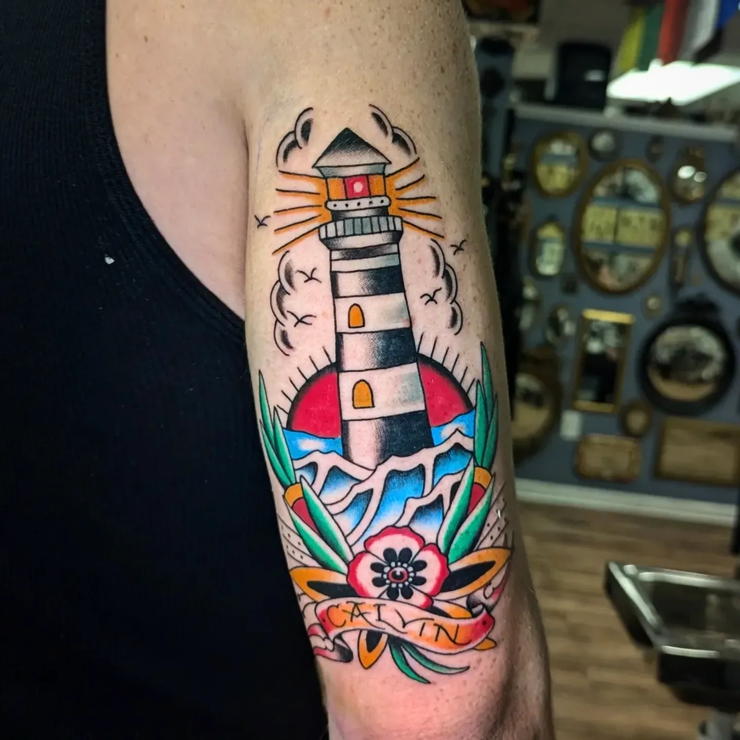 Lighthouse American traditional tattoo on the forearm by joseph palladino