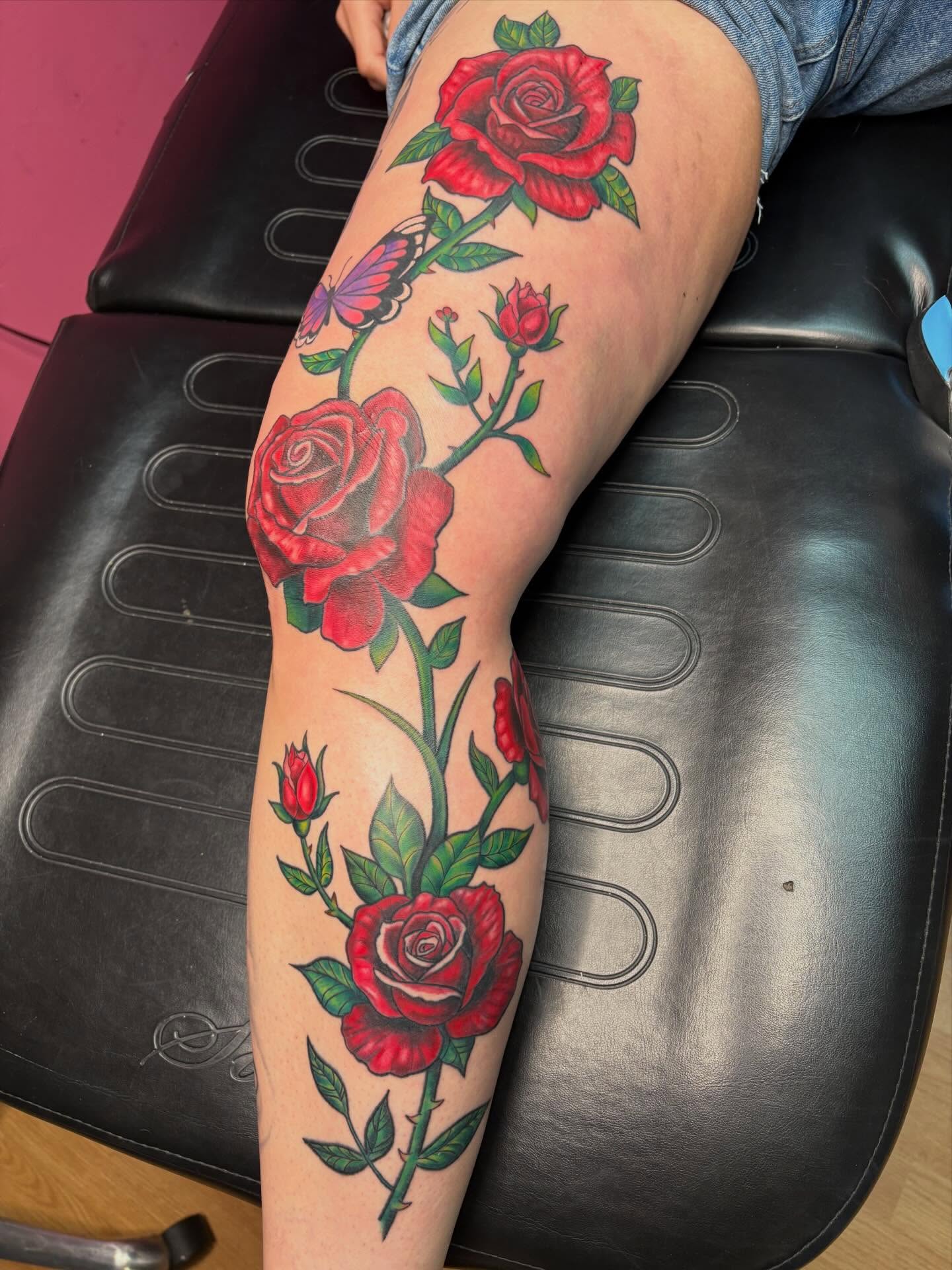 Roses and butterfly American traditional tattoo on the thigh by ~KR¥$~