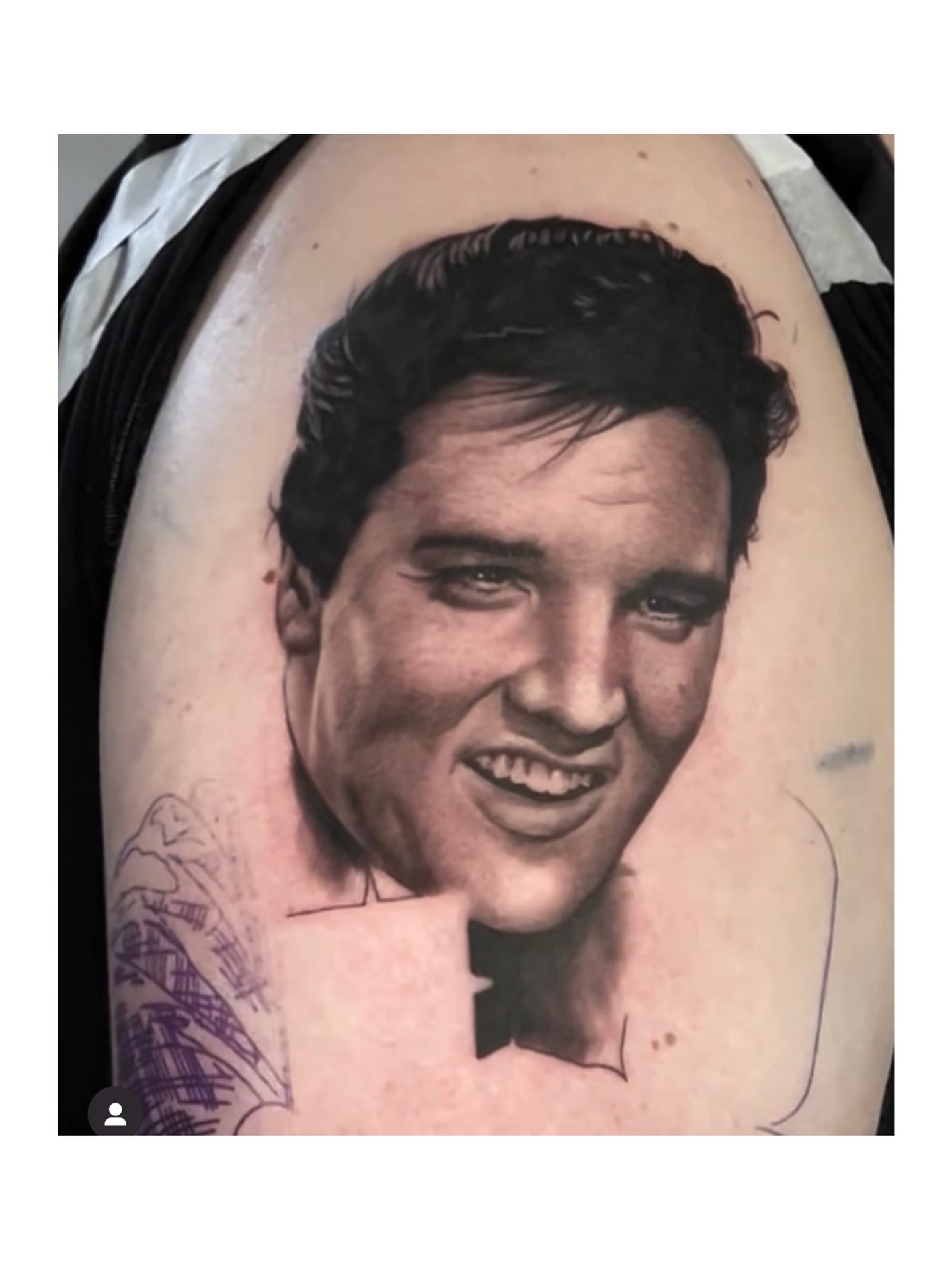 Elvis Presley portrait realism tattoo on the shoulder by Remko