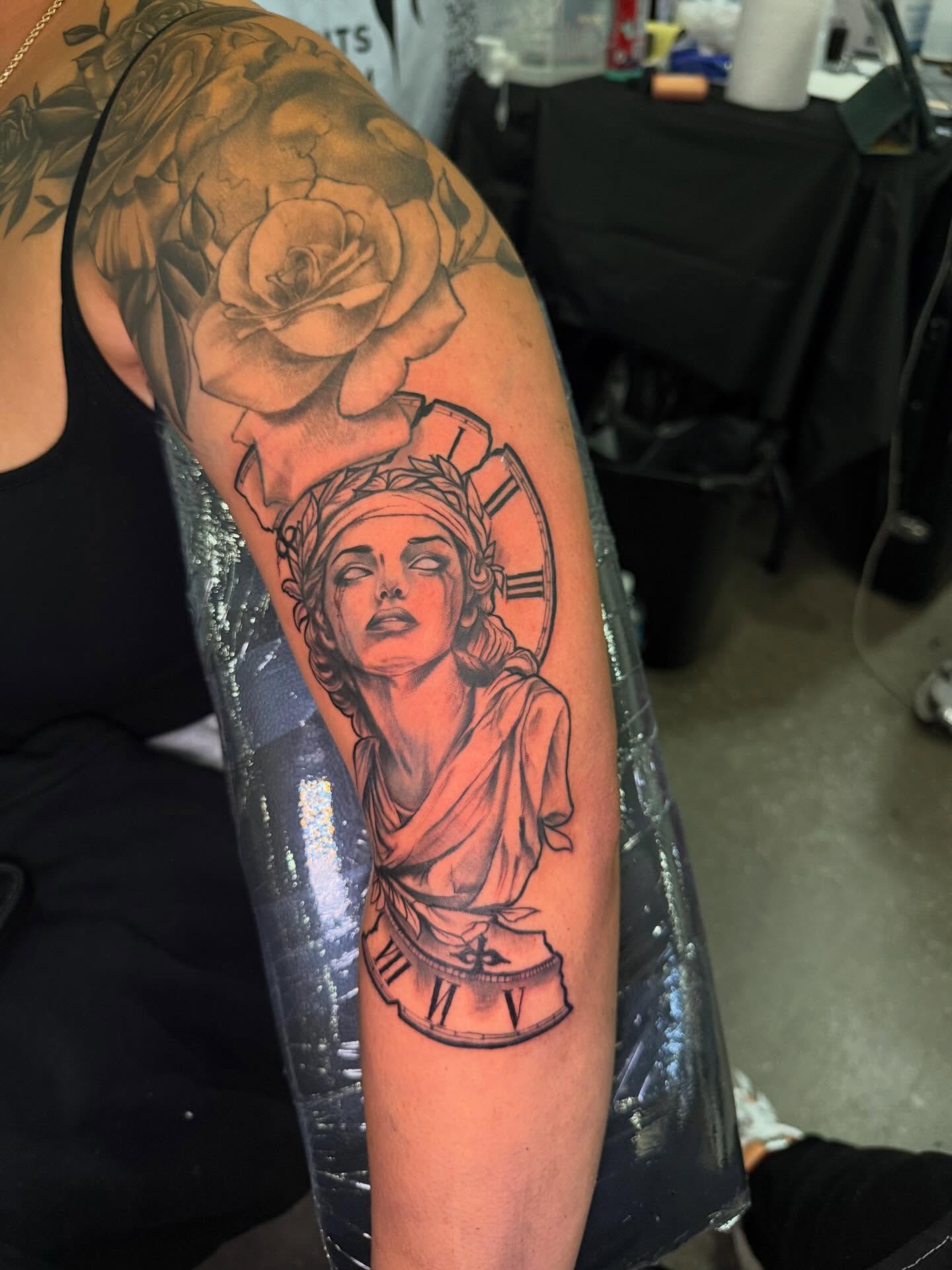 Statue of liberty realism tattoo on the forearm by InkdByHendrixx