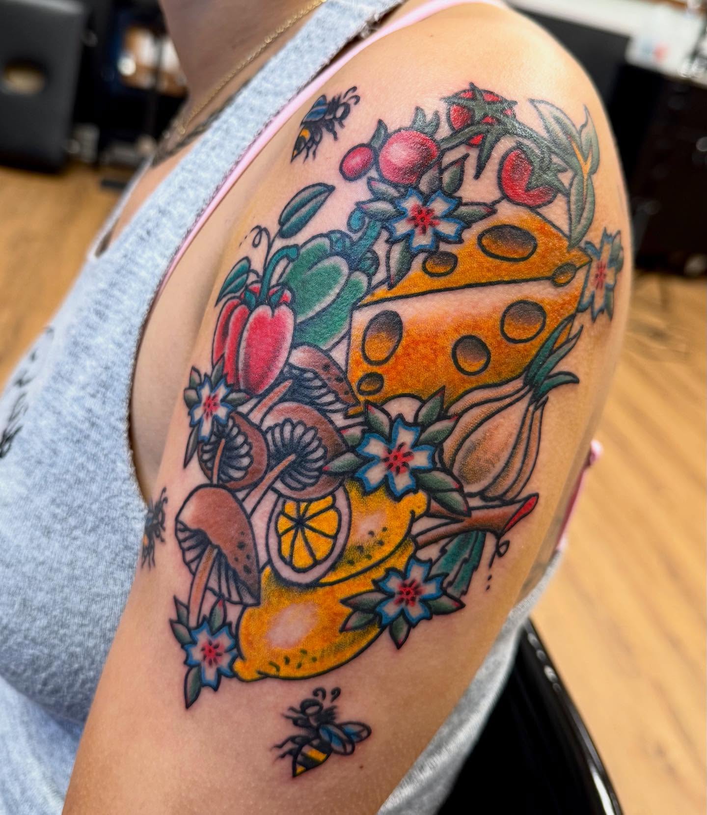 Cheese and fruit American traditional tattoo on the shoulder by Jesse Boss, Nashville, Tennessee