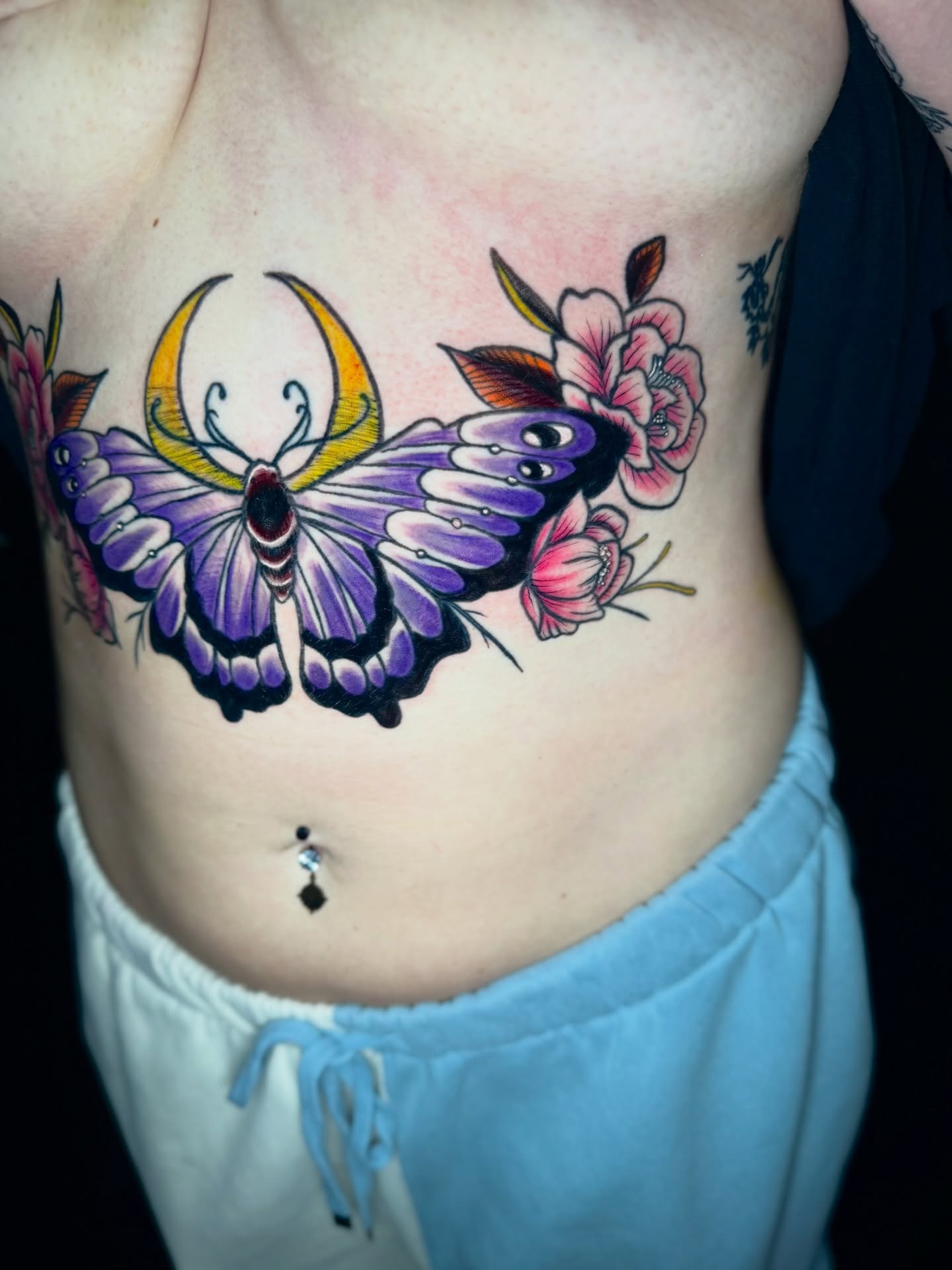 Butterfly and flowers American traditional tattoo on the ribs by Kevin A. Salinas ๐จ๐ด, Houston, Texas