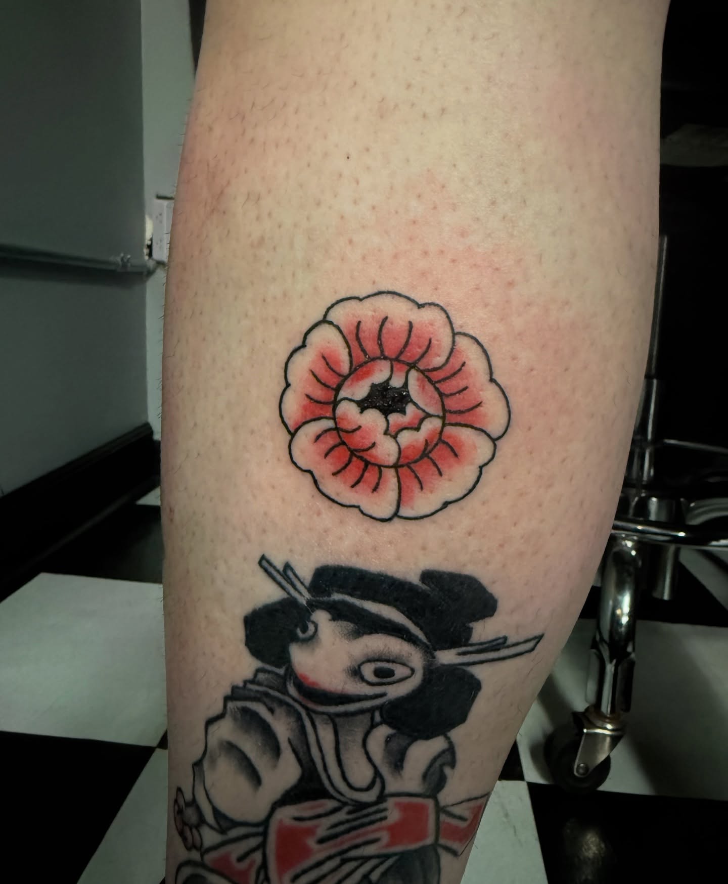Poppy flower American traditional tattoo on the forearm by Gabe Rosen