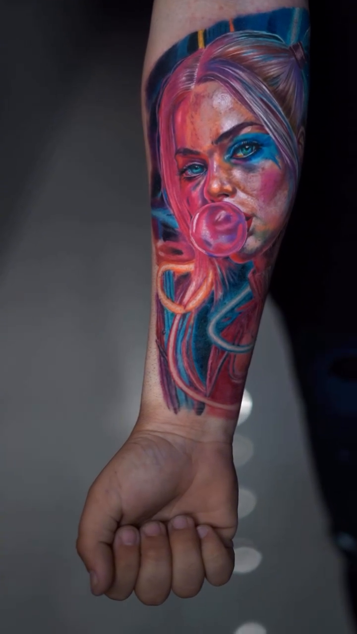 Portrait of a woman blowing bubblegum surrealism tattoo on the forearm by Alberto M