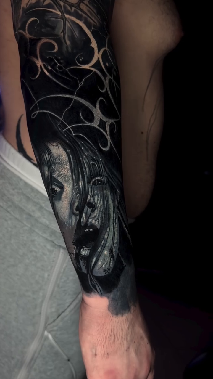Woman's face with abstract elements realism tattoo by Steven Pelkey, Eastpointe, Michigan