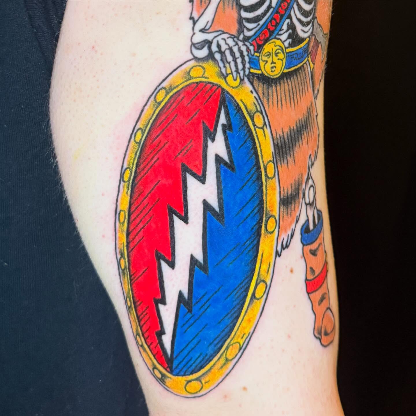 Lightning bolt American traditional tattoo on the forearm by Henry Bubula, Minneapolis, Minnesota