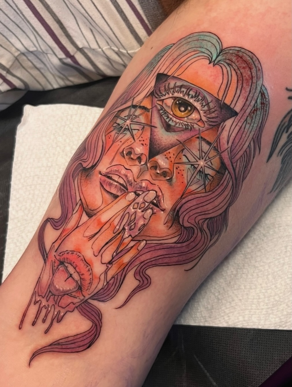 Woman smoking realism tattoo on the forearm by Andrea Patterson