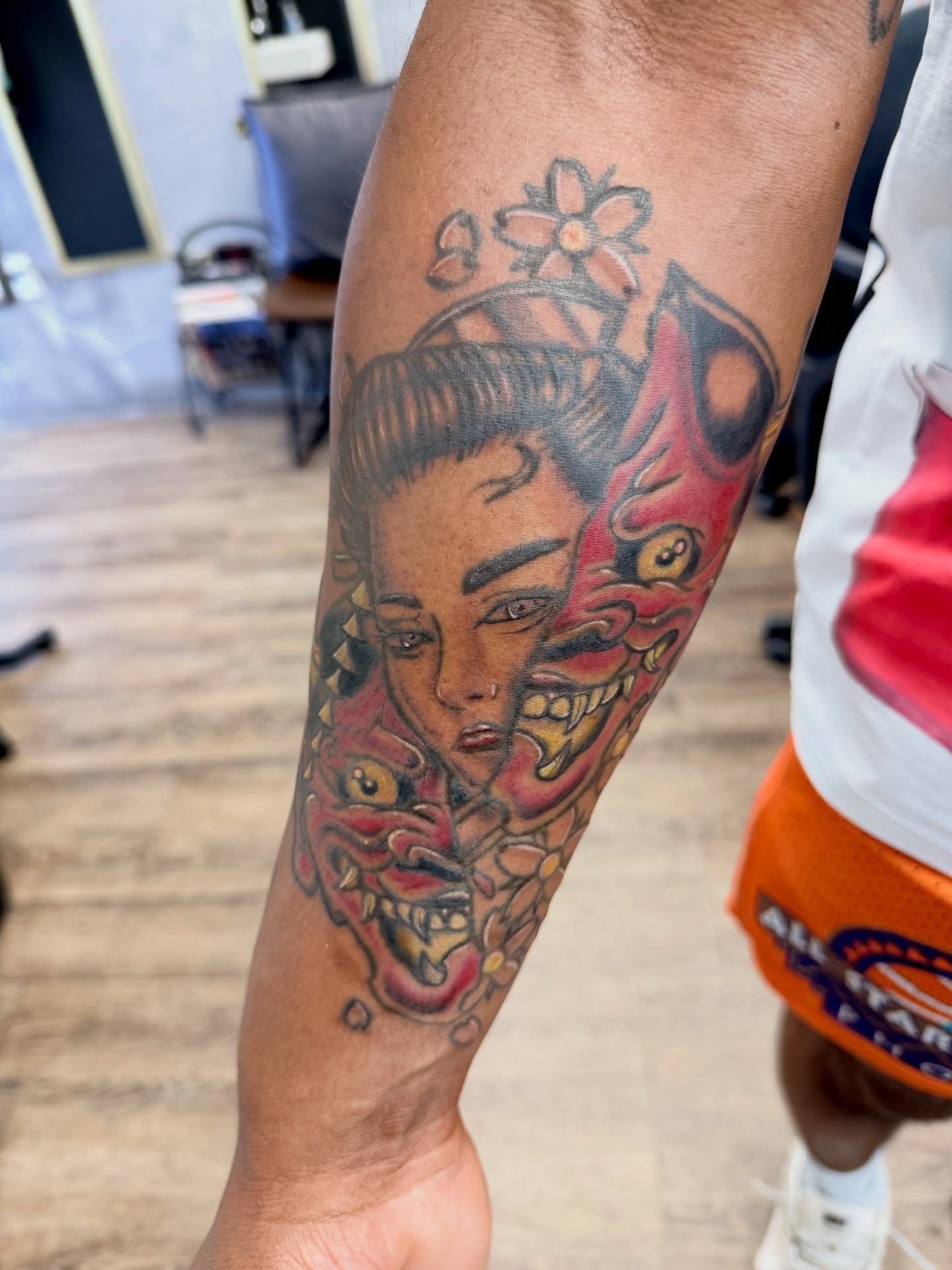 Woman with dragon japanese irezumi tattoo on the forearm by Chris