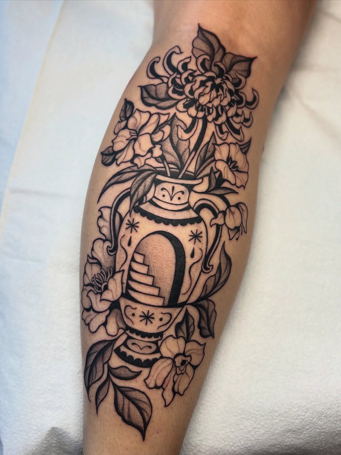 Vase with flowers black and grey tattoo on the forearm by ๐ฅ Jas ๐ฅ