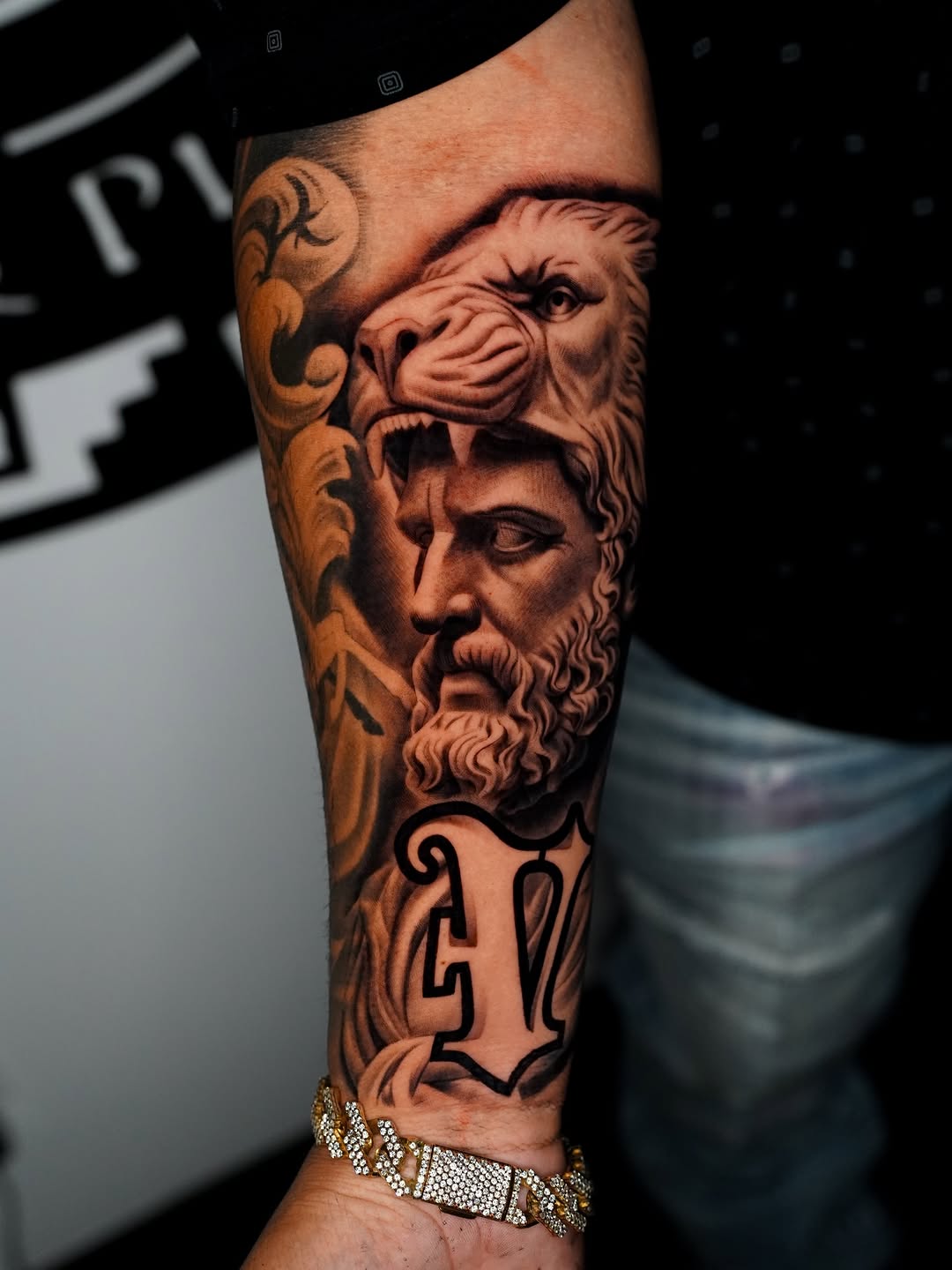 Hercules with lion head realism tattoo on the forearm by Salvador Saenz Jr, Dallas, Texas