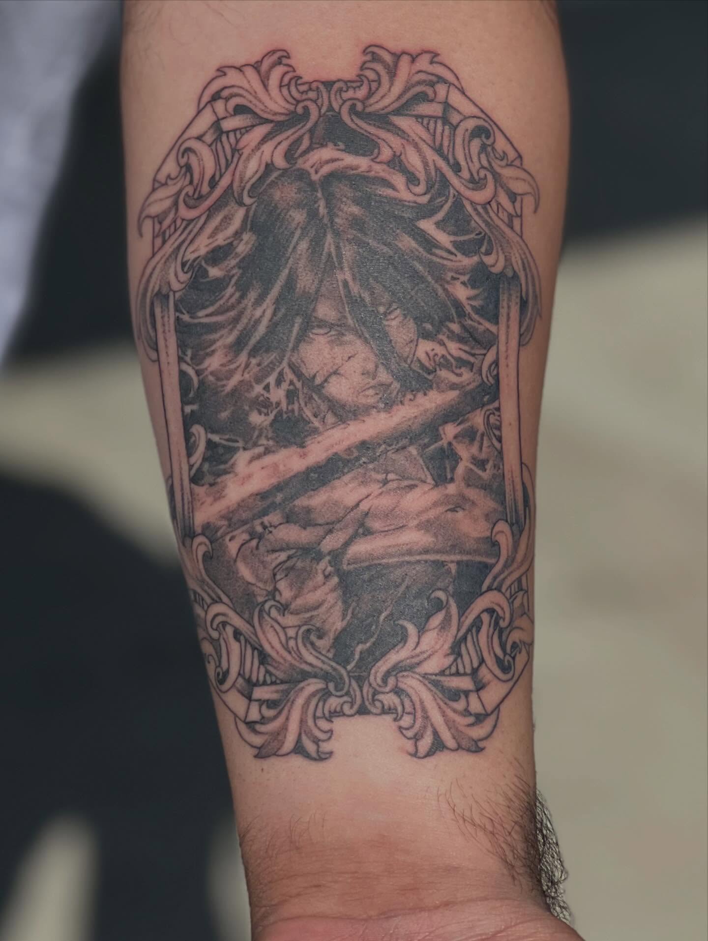 Anime character anime tattoo on the forearm by Dark Luna Tattoos LLC
