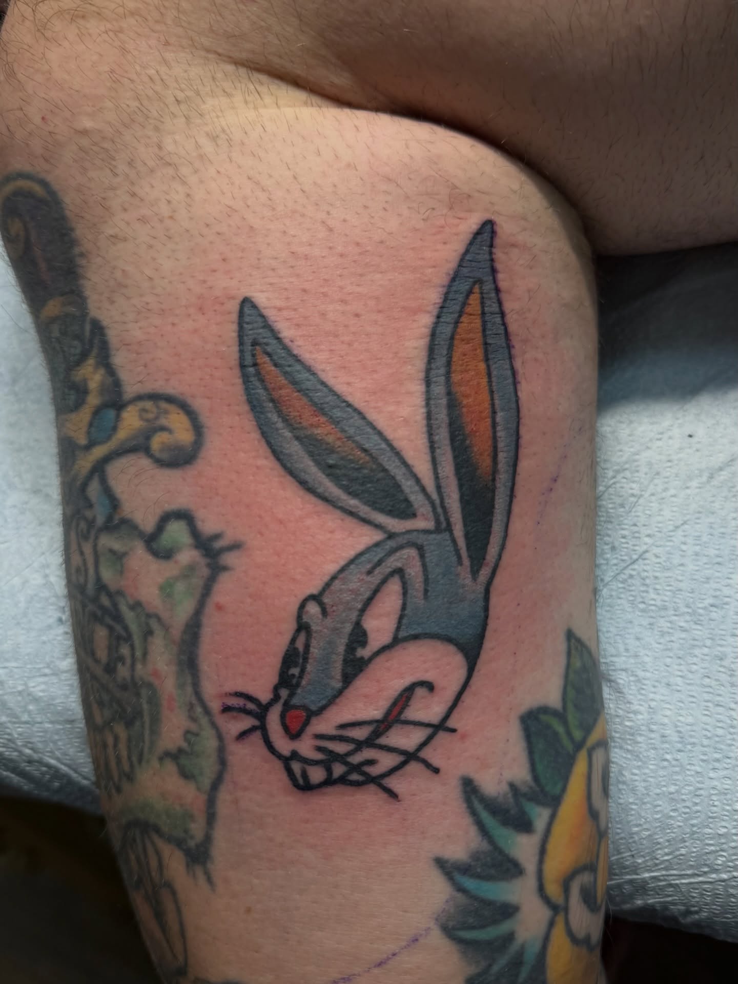 Bugs bunny American traditional tattoo on the thigh by Waylon