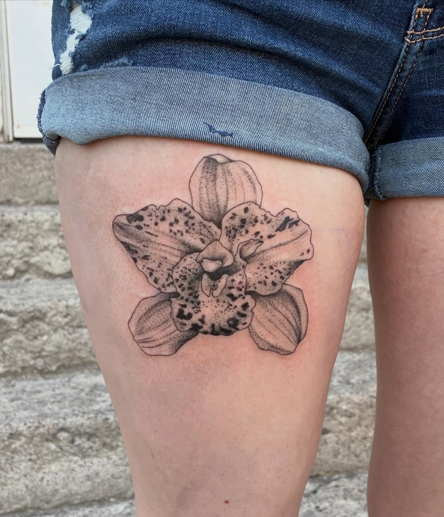 Orchid dotwork tattoo on the thigh by Linzi Hungerford, Bozeman, Montana