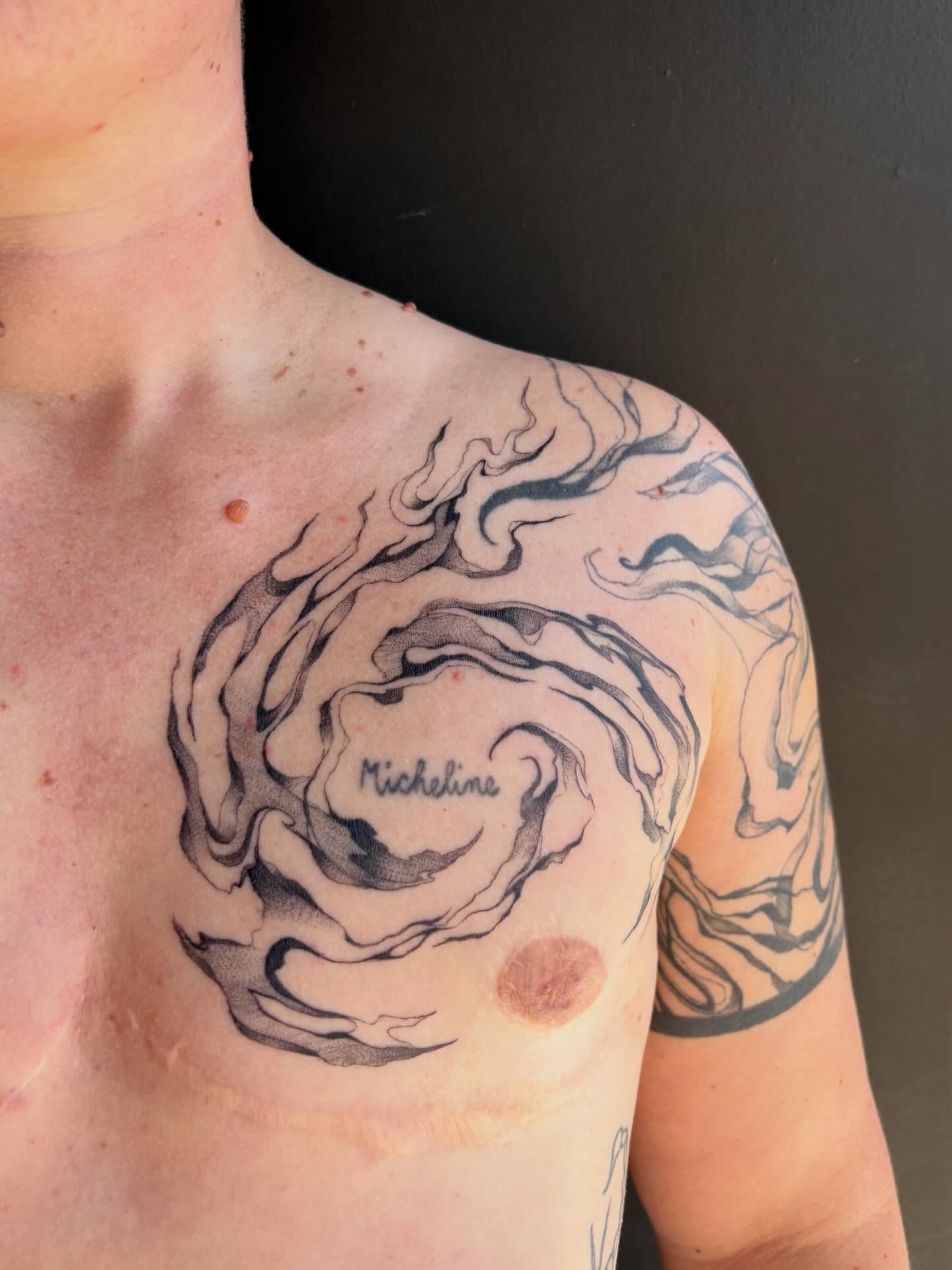 Swirling pattern dotwork tattoo on the chest by cindy ha soul son