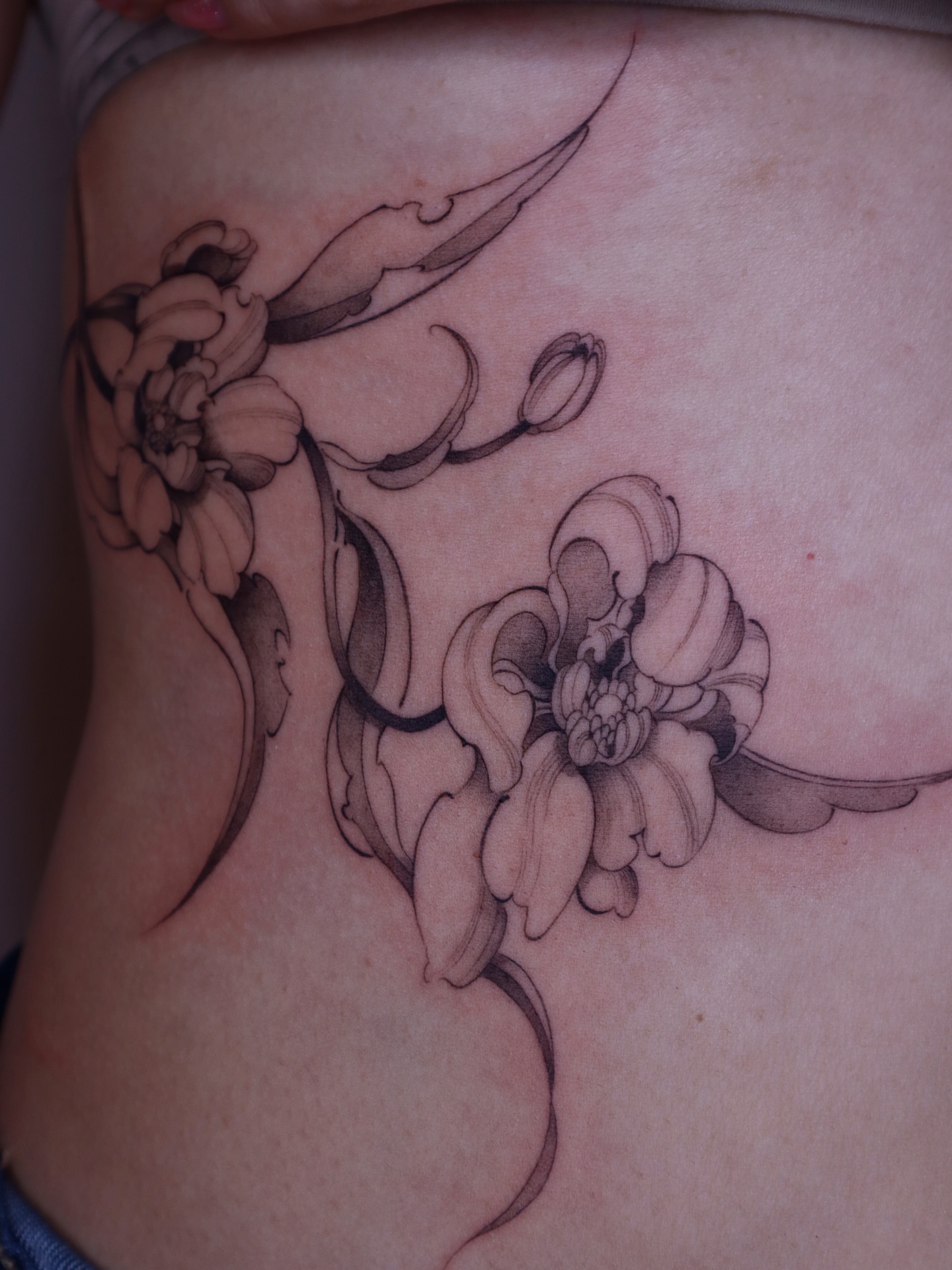 Tattoo by @maid.of.flowers — black_and_grey