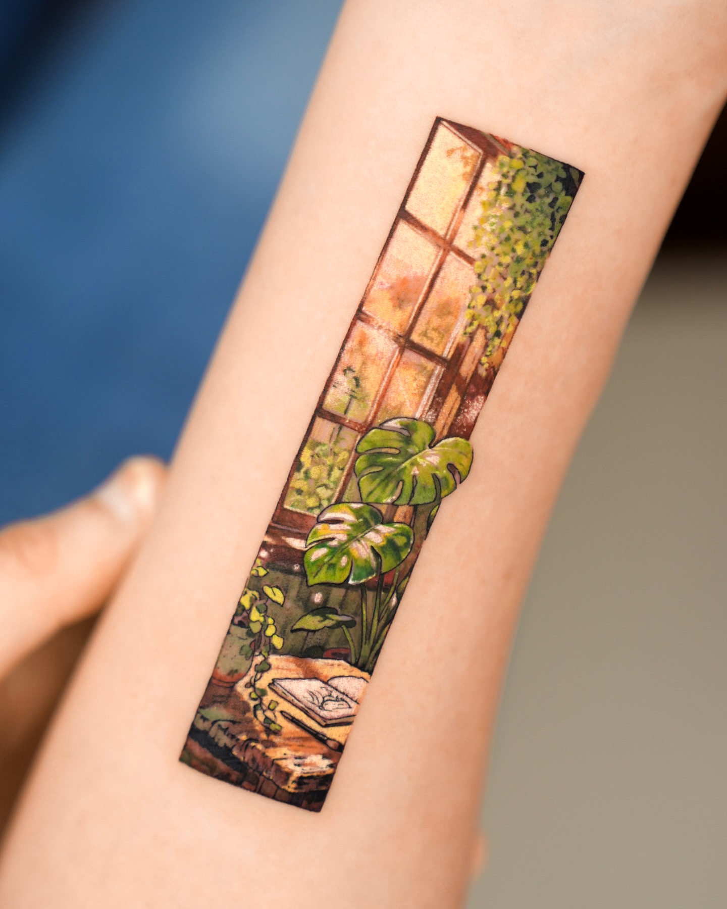 Window with plants realism tattoo on the forearm by YUN