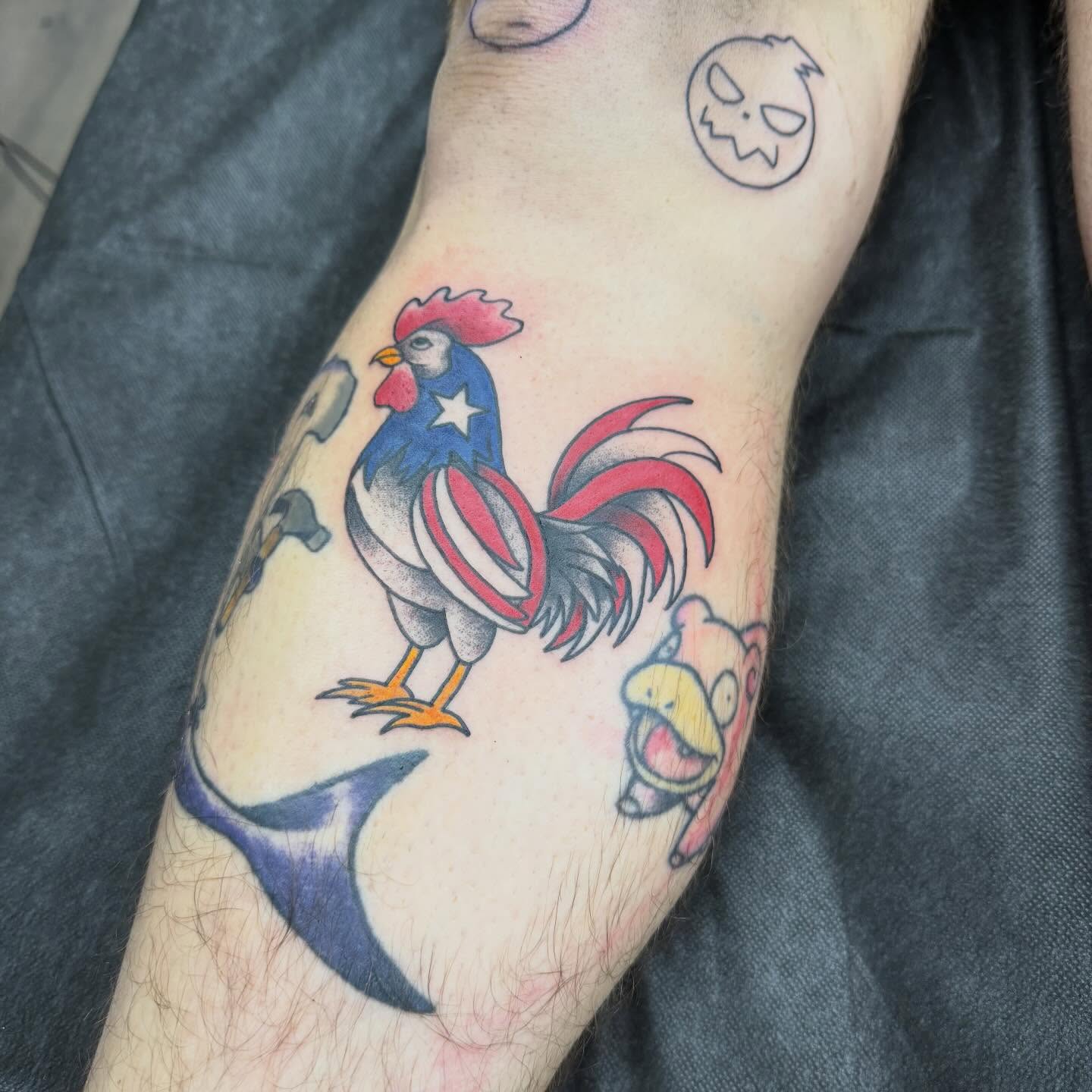 Rooster American traditional tattoo on the forearm by Matt Hattaway