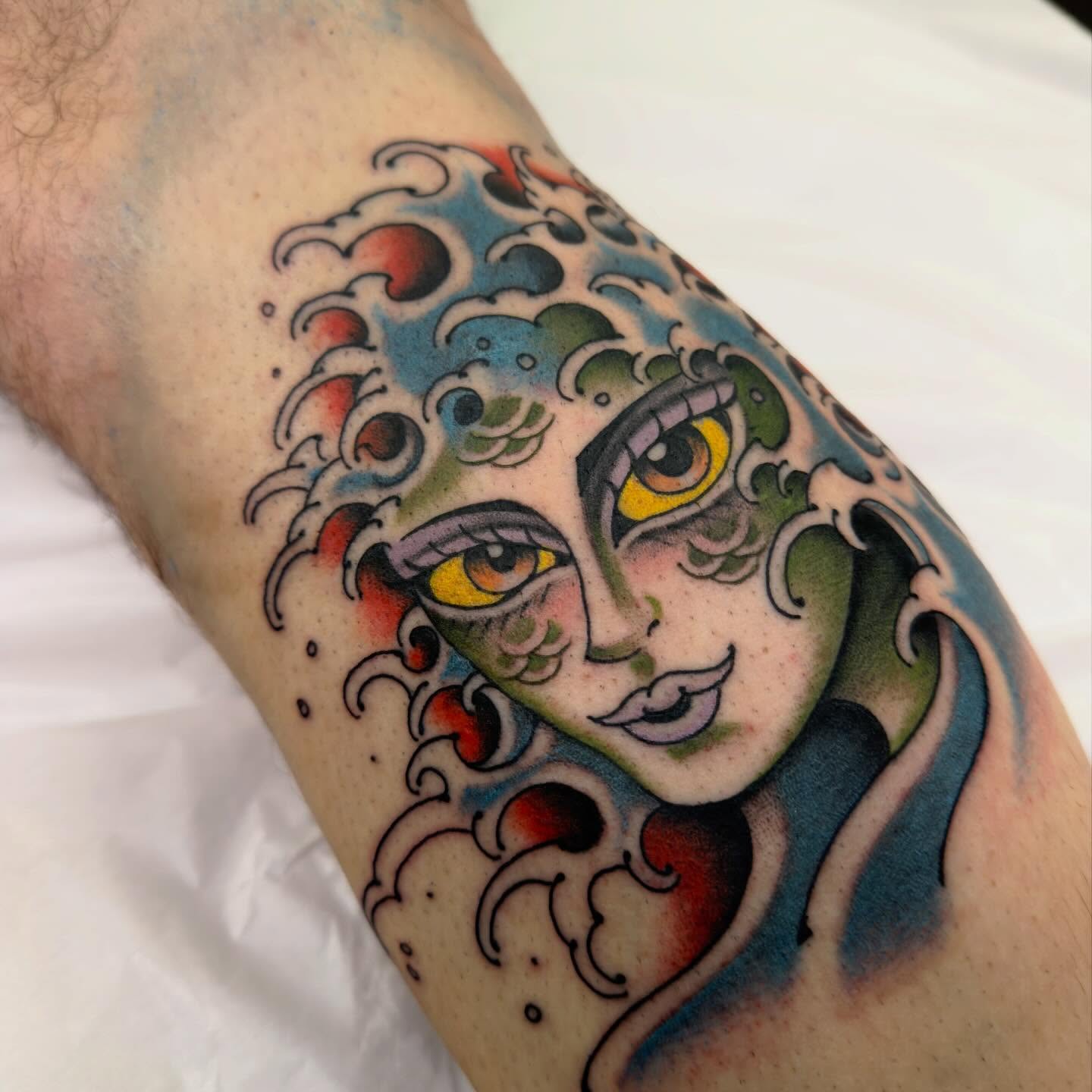 Woman's face American traditional tattoo on the forearm by Bryan Ortega
