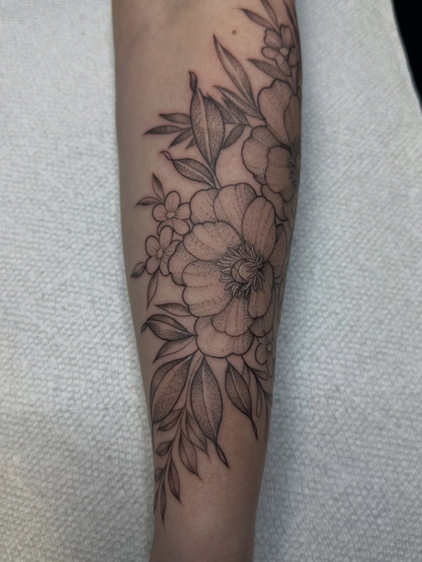 Floral bouquet dotwork tattoo on the forearm by Tiffany ✿ Tattoo Artist