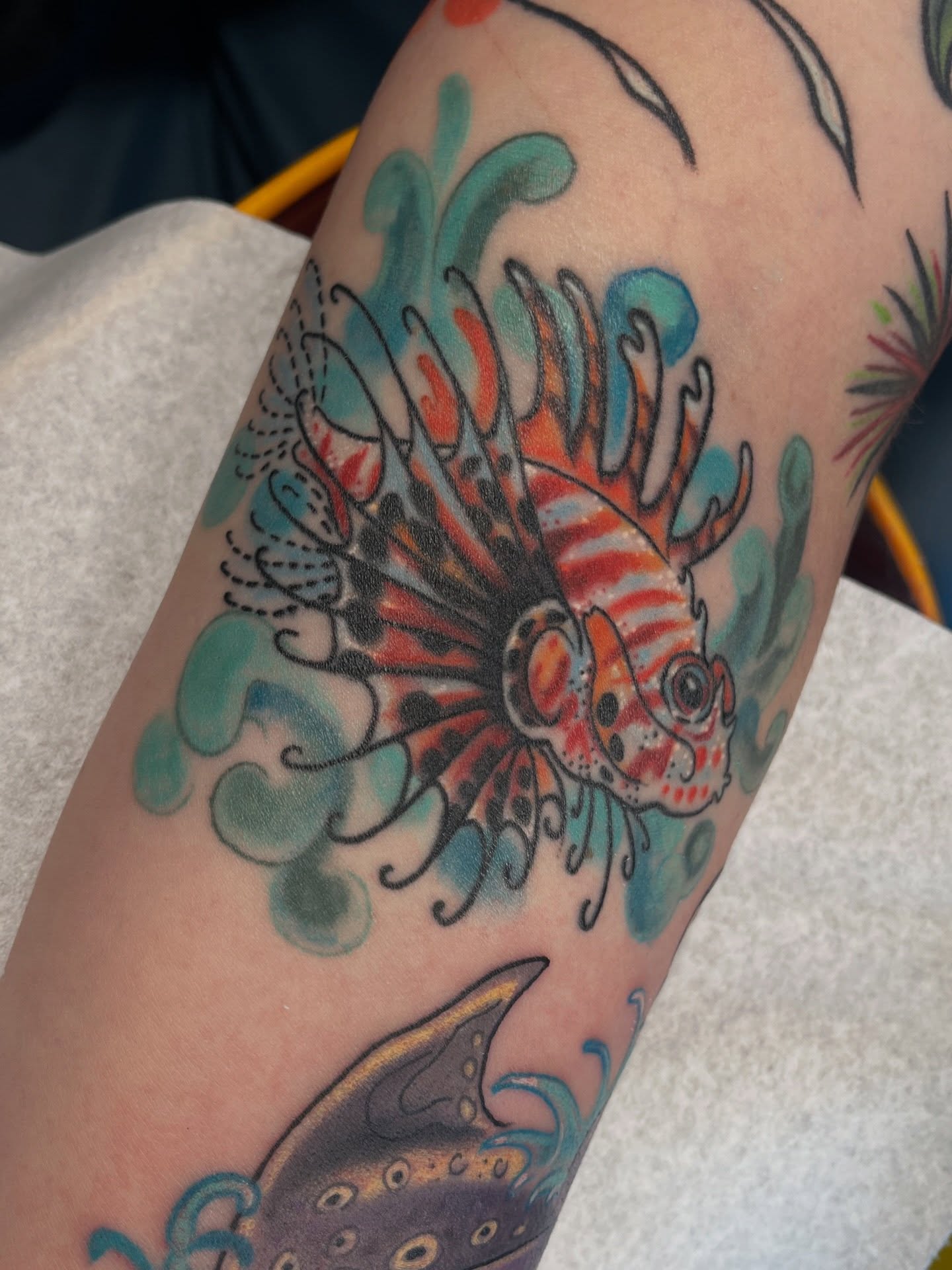 Lionfish American traditional tattoo on the forearm by Allyson Blessing Tattoos
