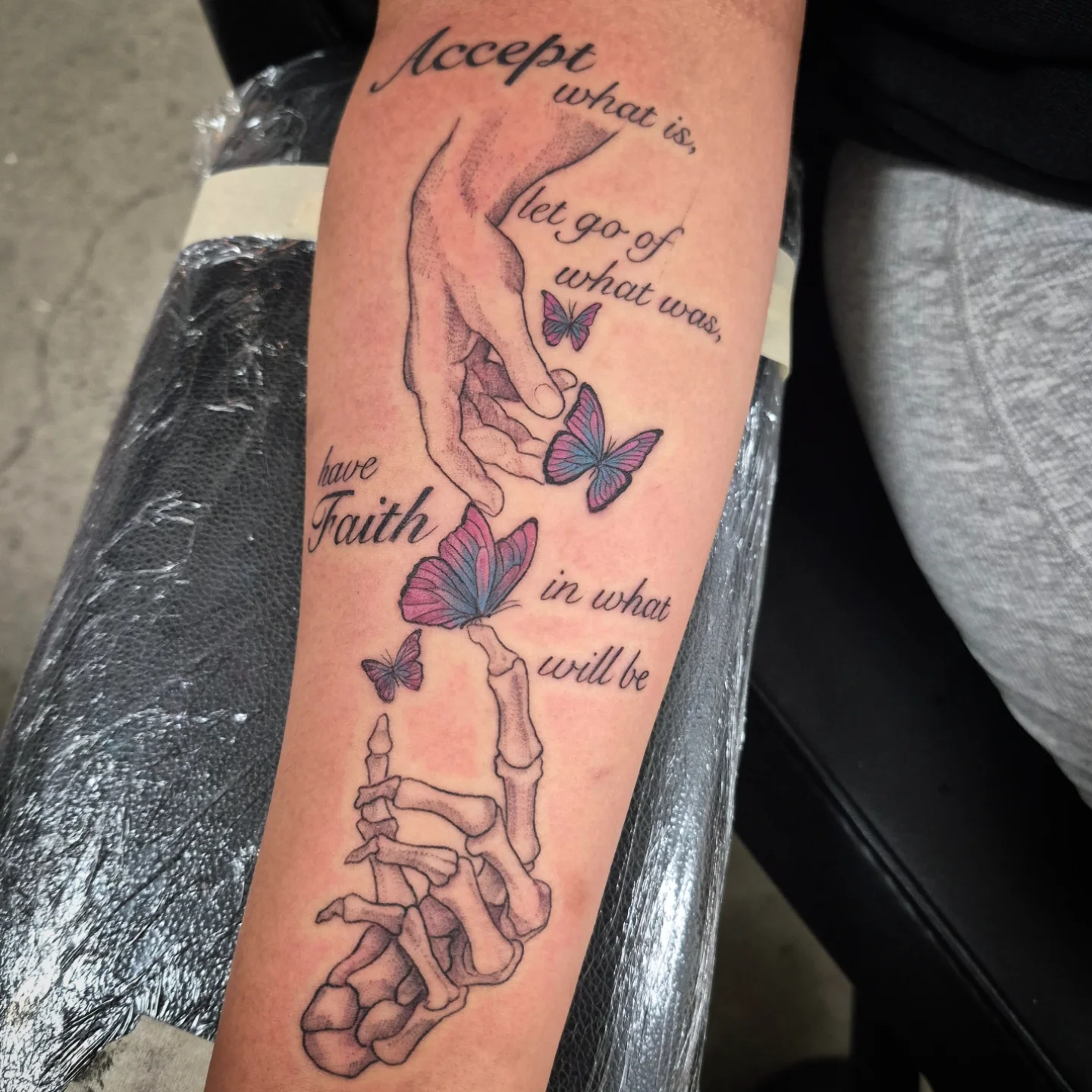 Motivational quote dotwork tattoo on the forearm by Lydia Kiley