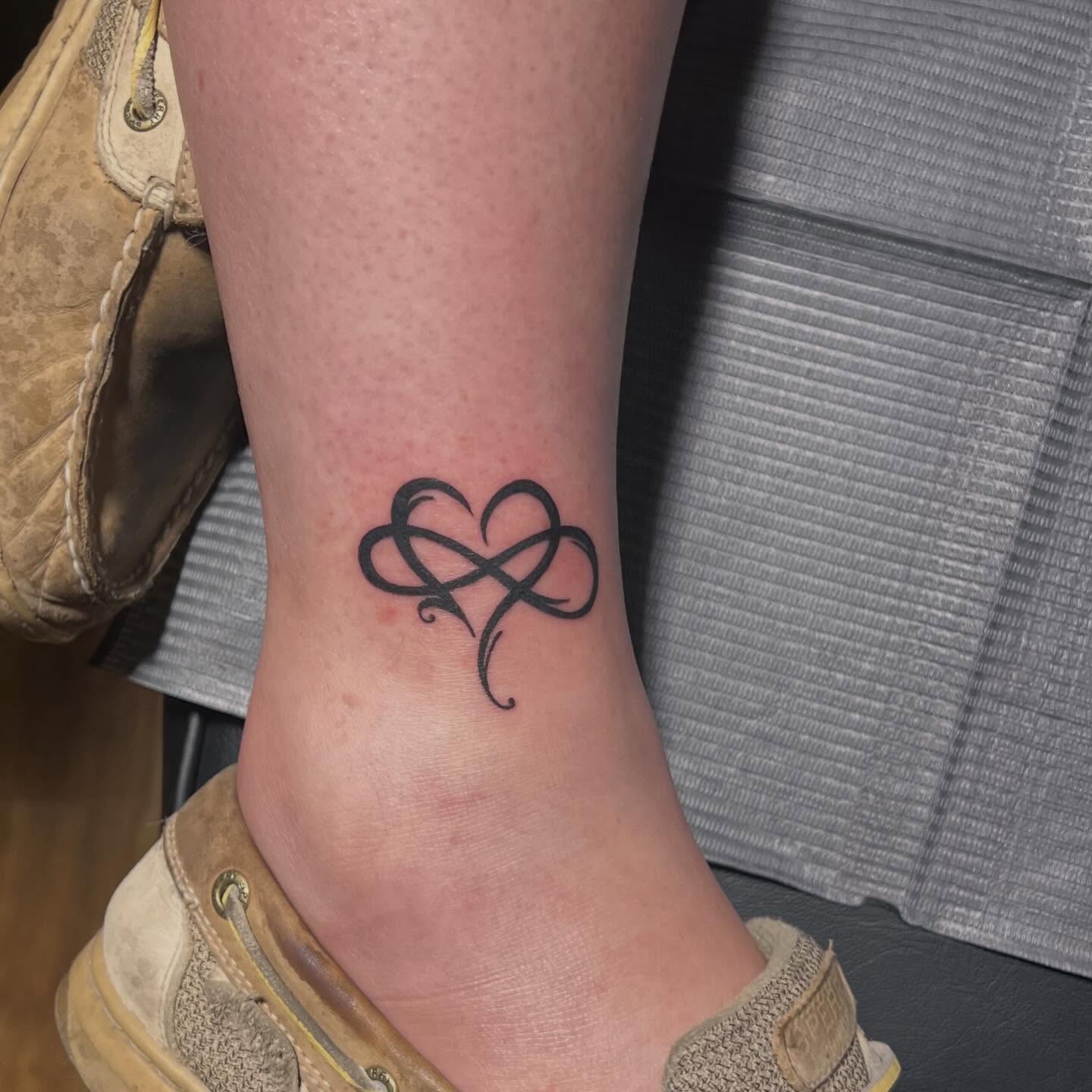 Tattoo by @lynk.art — black_and_grey