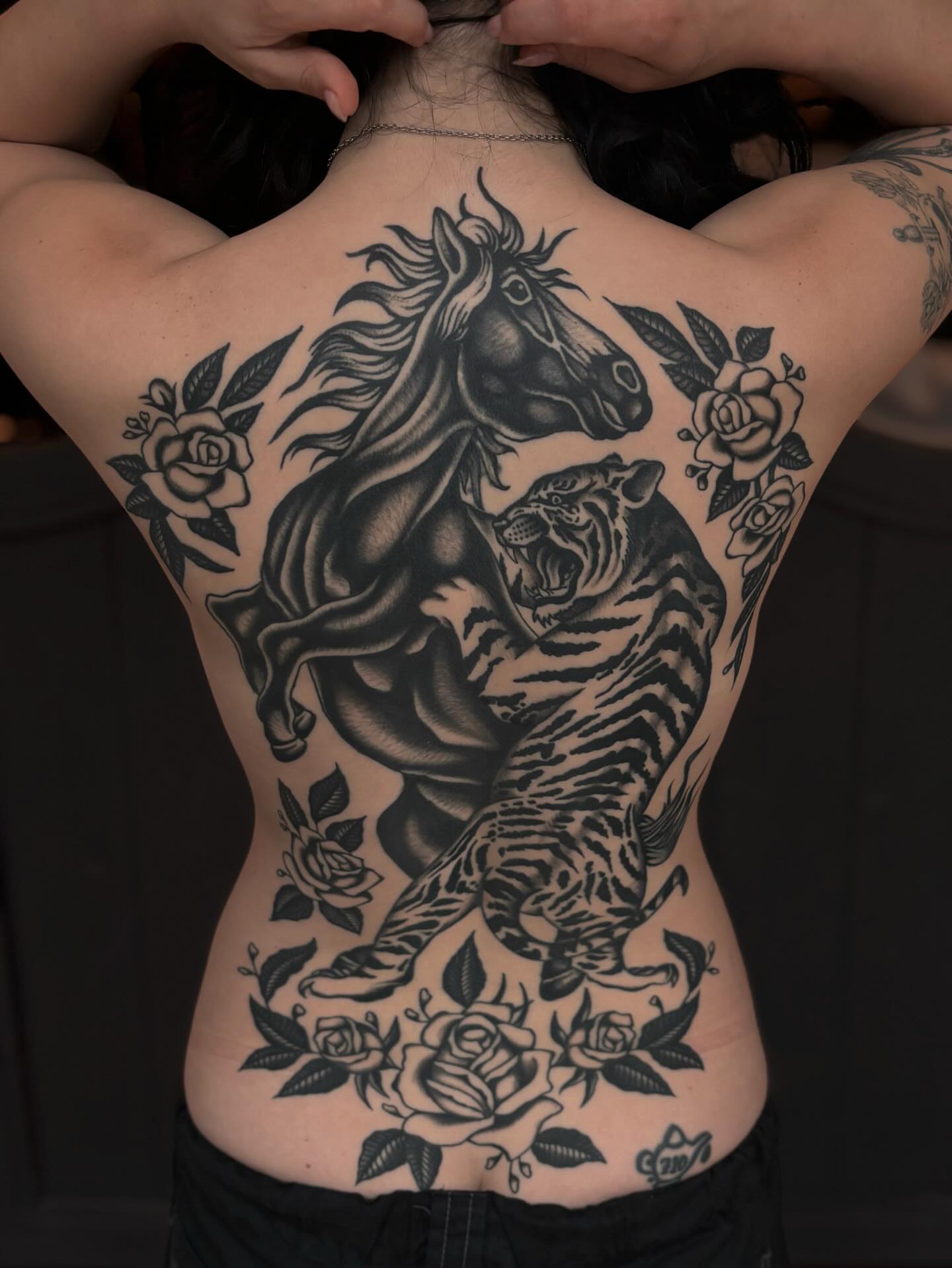 Horse and tiger American traditional tattoo on the back by Jesse Smith, Chicago, Illinois